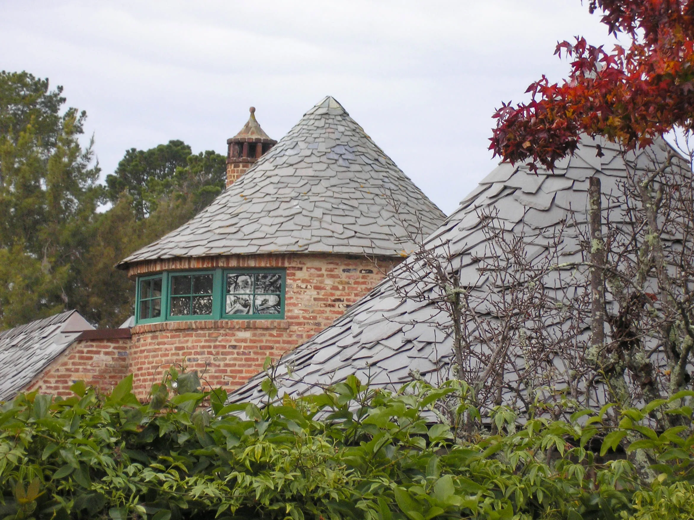 Picture of The enchanting round towers with expertly crafted slate roofs highlight Sterling Roofing Co., Inc.'s focus on quality outcomes. Their commitment to excellence ensures every detail meets high standards. Copyright ©2025 Diamond Certified Resource

 - Sterling Roofing Co., Inc.