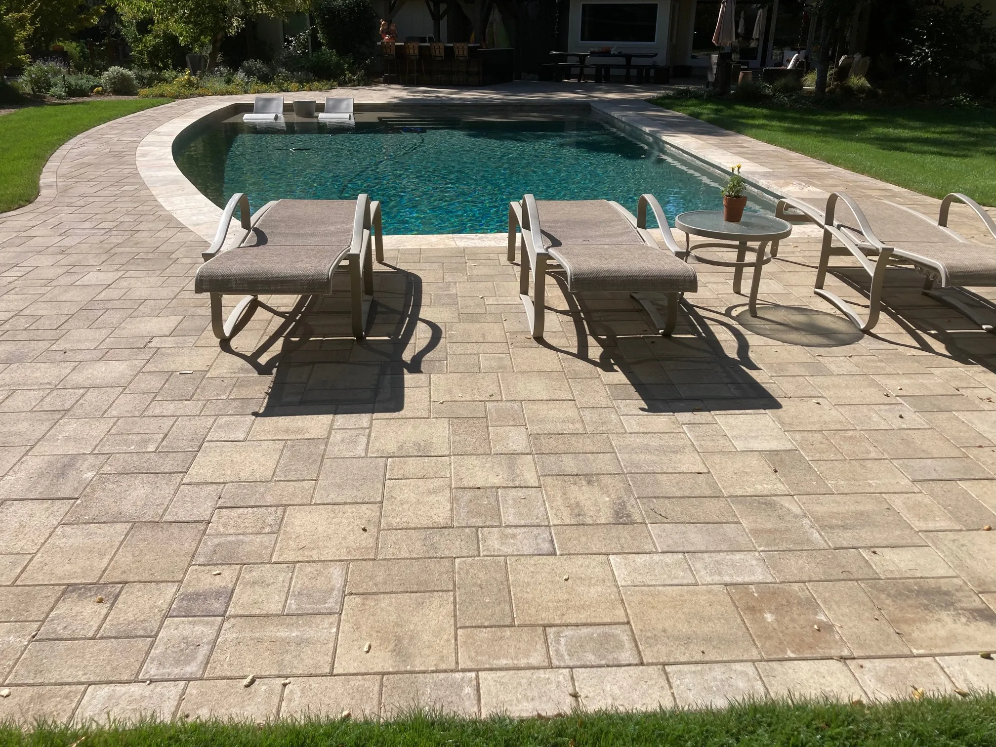 Picture of Sunlight dances on the finely crafted poolside pavers, setting the stage for serene relaxation. The Legacy Paver Group, recognized for its expertise and quality, transforms outdoor spaces into tranquil retreats. Copyright ©2025 Diamond Certified Resource

 - The Legacy Paver Group