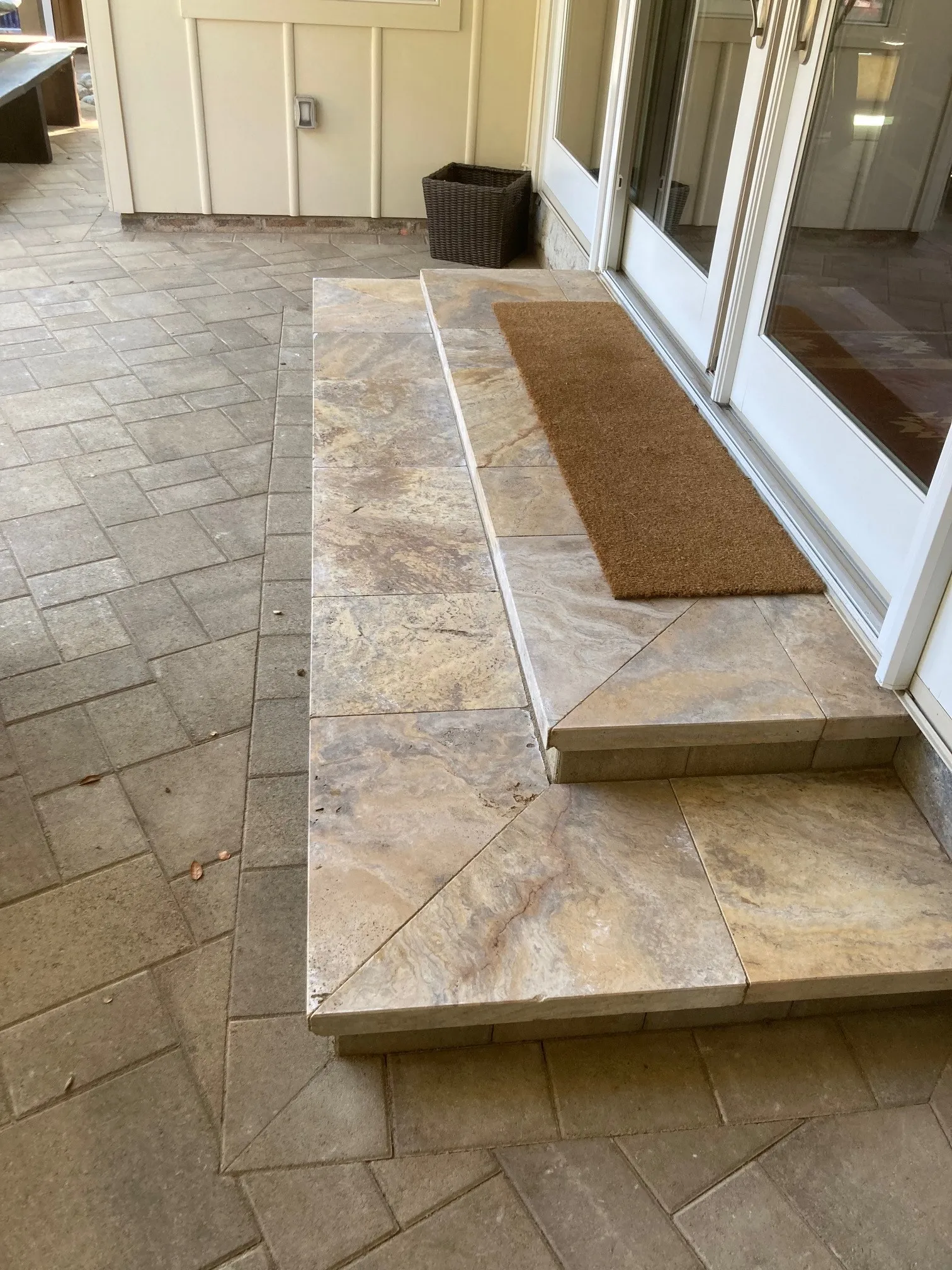 Picture of Subtle patterns in stone steps lead to a seamless entryway, reflecting The Legacy Paver Group's focus on quality outcomes. Experience the entrance of elegance every day. Copyright ©2025 Diamond Certified Resource

 - The Legacy Paver Group