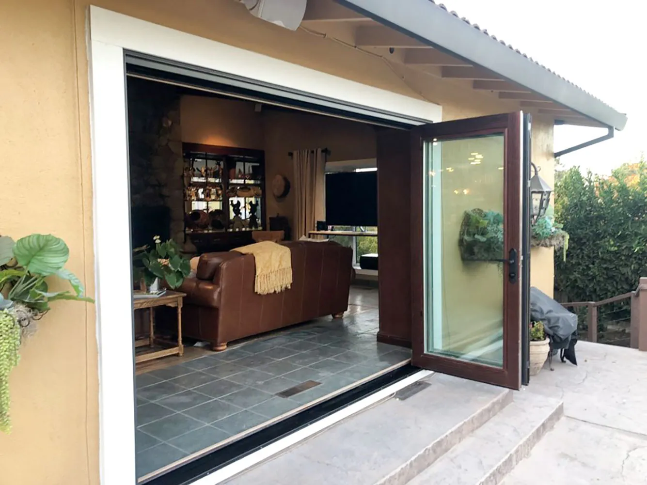 Picture of Abstract Windows creates seamless transitions between indoor comfort and outdoor beauty. This open doorway frames a cozy living space, reflecting the companyâ€™s focus on quality outcomes. Copyright ©2025 Diamond Certified Resource

 - Abstract Windows