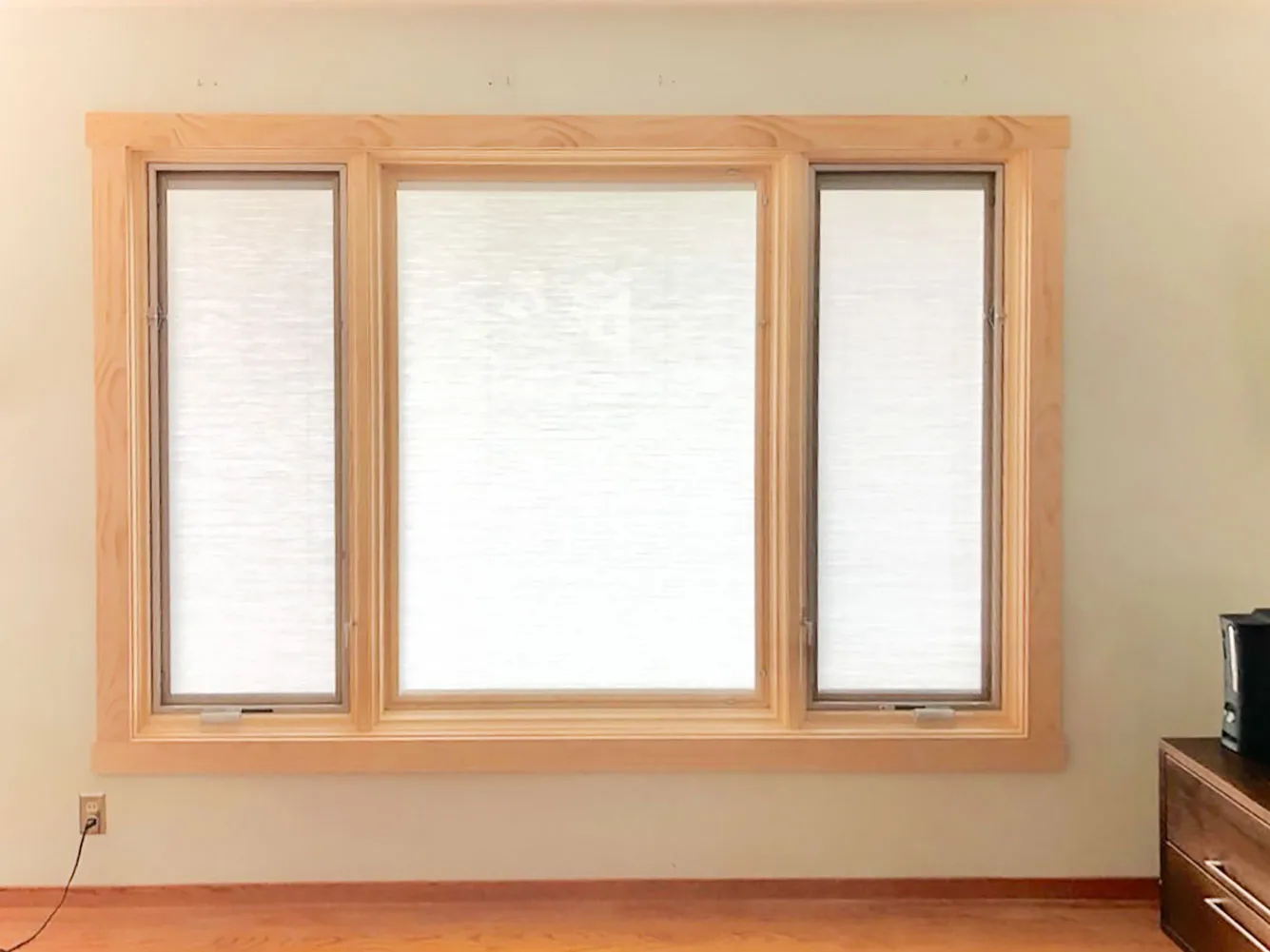 Picture of A newly installed three-section window by Abstract Windows stands as a testament to their commitment to quality outcomes. The sleek design enhances the room's ambiance. Abstract Windows has high customer satisfaction ratings. Copyright ©2025 Diamond Certified Resource

 - Abstract Windows