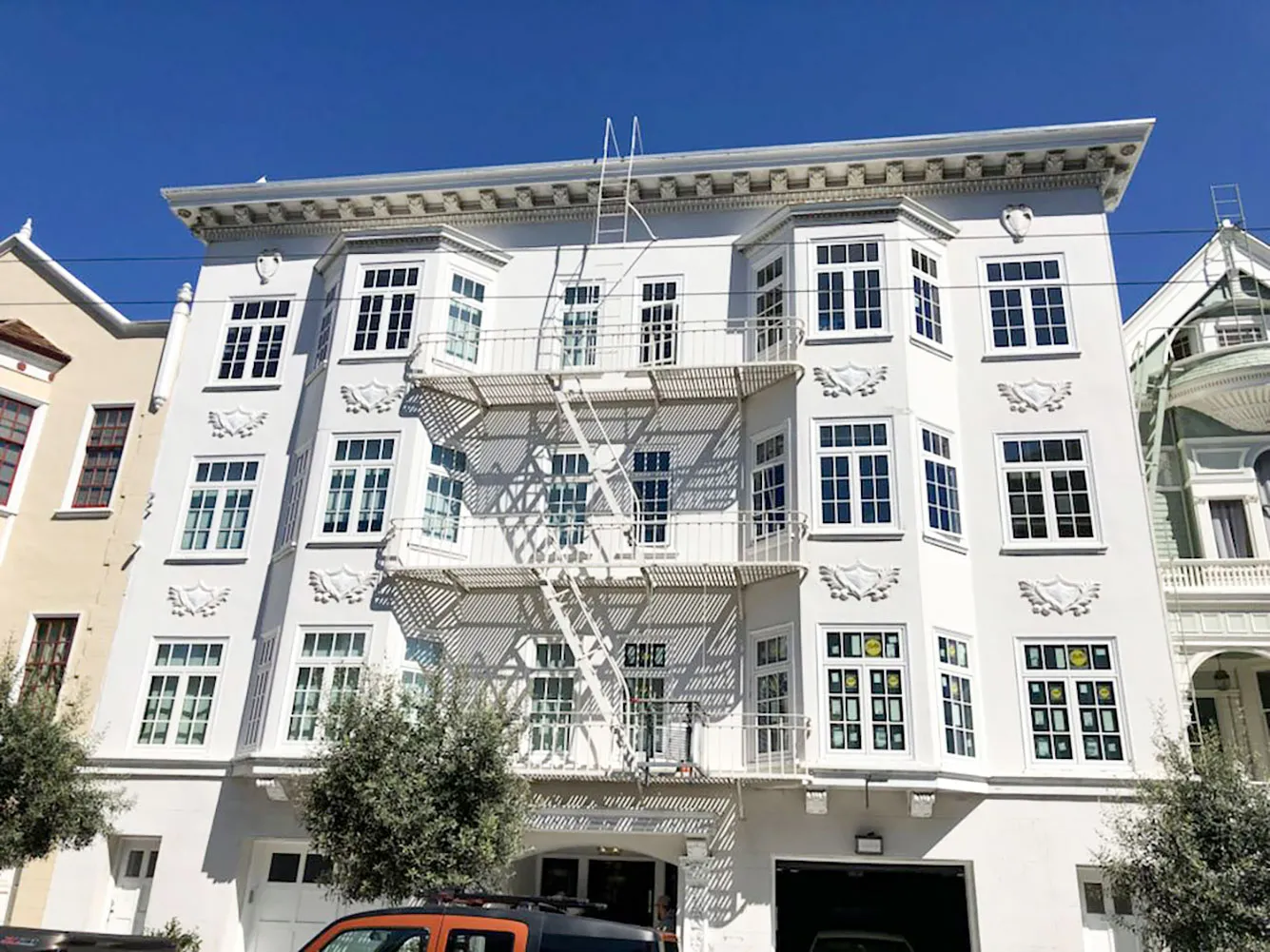 Picture of The crisp, intricate designs of this building's facade highlight Abstract Windows' commitment to quality outcomes. Each window reflects expert craftsmanship. Abstract Windows consistently achieved a Highest in Quality rating. Copyright ©2025 Diamond Certified Resource - Abstract Windows