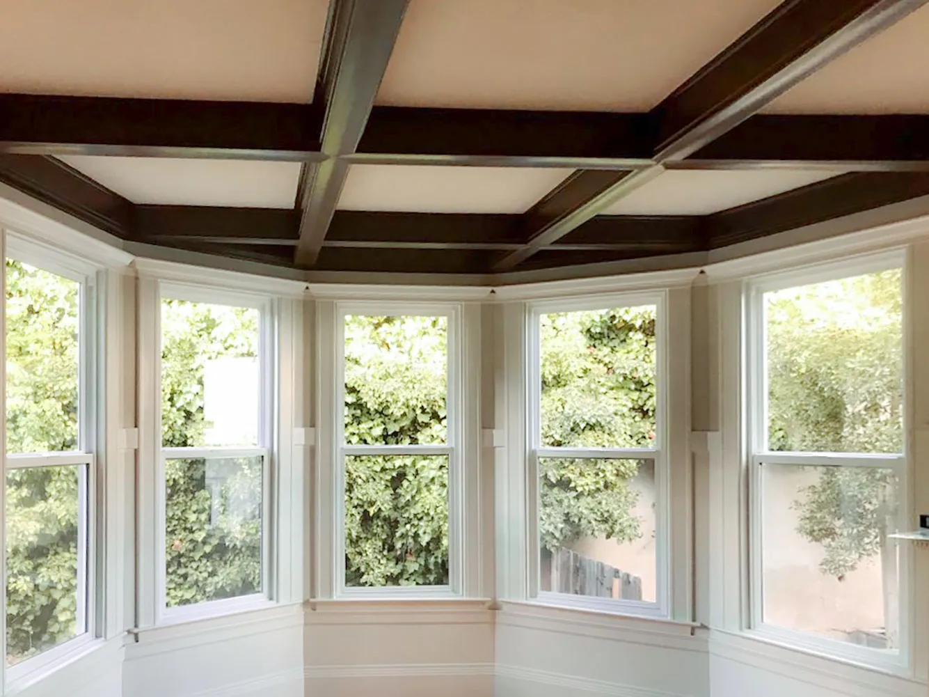 Picture of The elegantly framed bay windows overlook a verdant backdrop, showcasing Abstract Windowsâ€™ dedication to enhancing home aesthetics. Recognized for expertise and quality, they transform views with precision. Copyright ©2025 Diamond Certified Resource

 - Abstract Windows