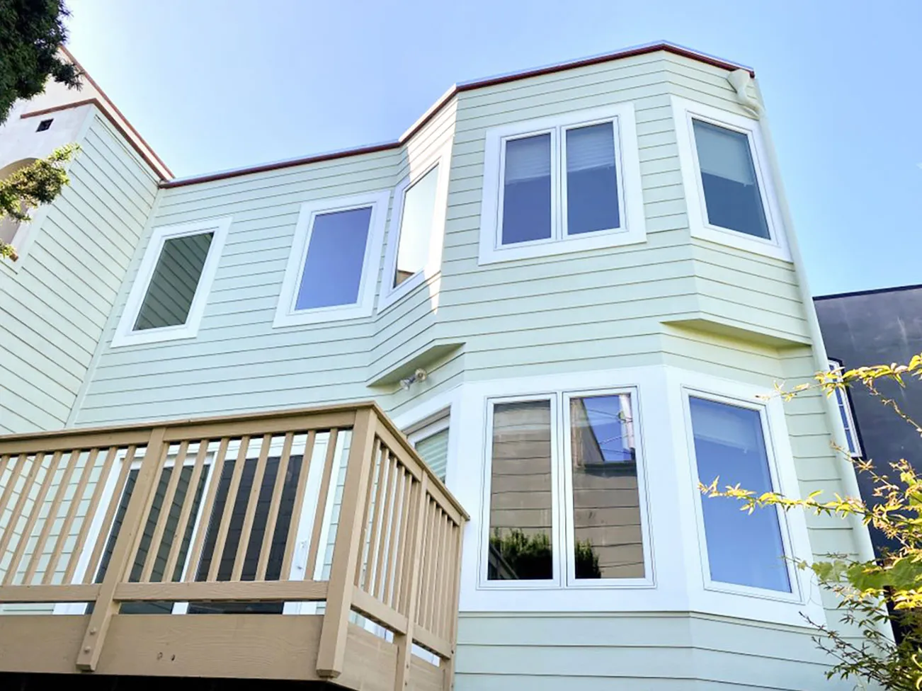 Picture of The pristine facade of a home showcases expertly installed windows by Abstract Windows, highlighting their focus on quality outcomes and customer satisfaction. Copyright ©2025 Diamond Certified Resource - Abstract Windows