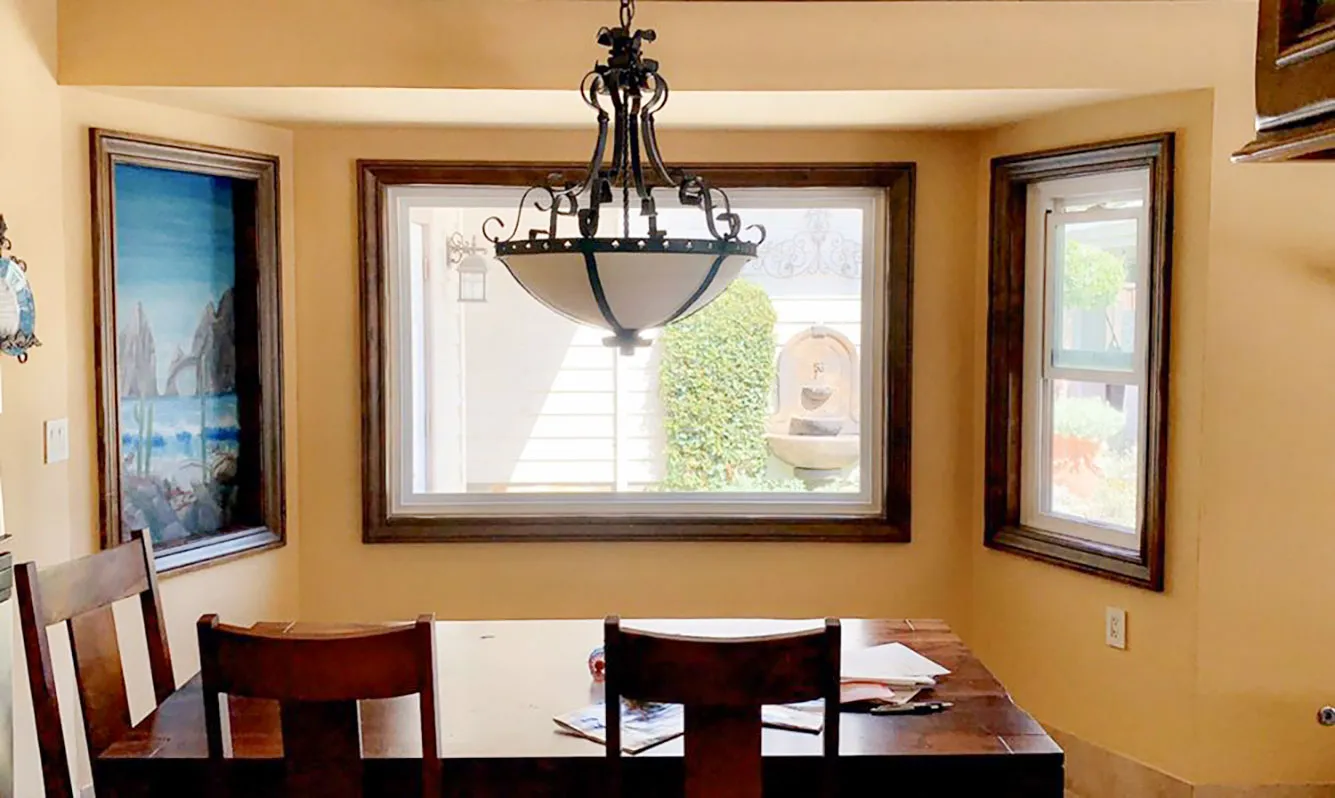 Picture of Sunlight filters gently through newly installed windows, framed with precision by Abstract Windows, creating a serene dining nook. The companyâ€™s focus on quality outcomes is evident in every detail. Copyright ©2025 Diamond Certified Resource

 - Abstract Windows