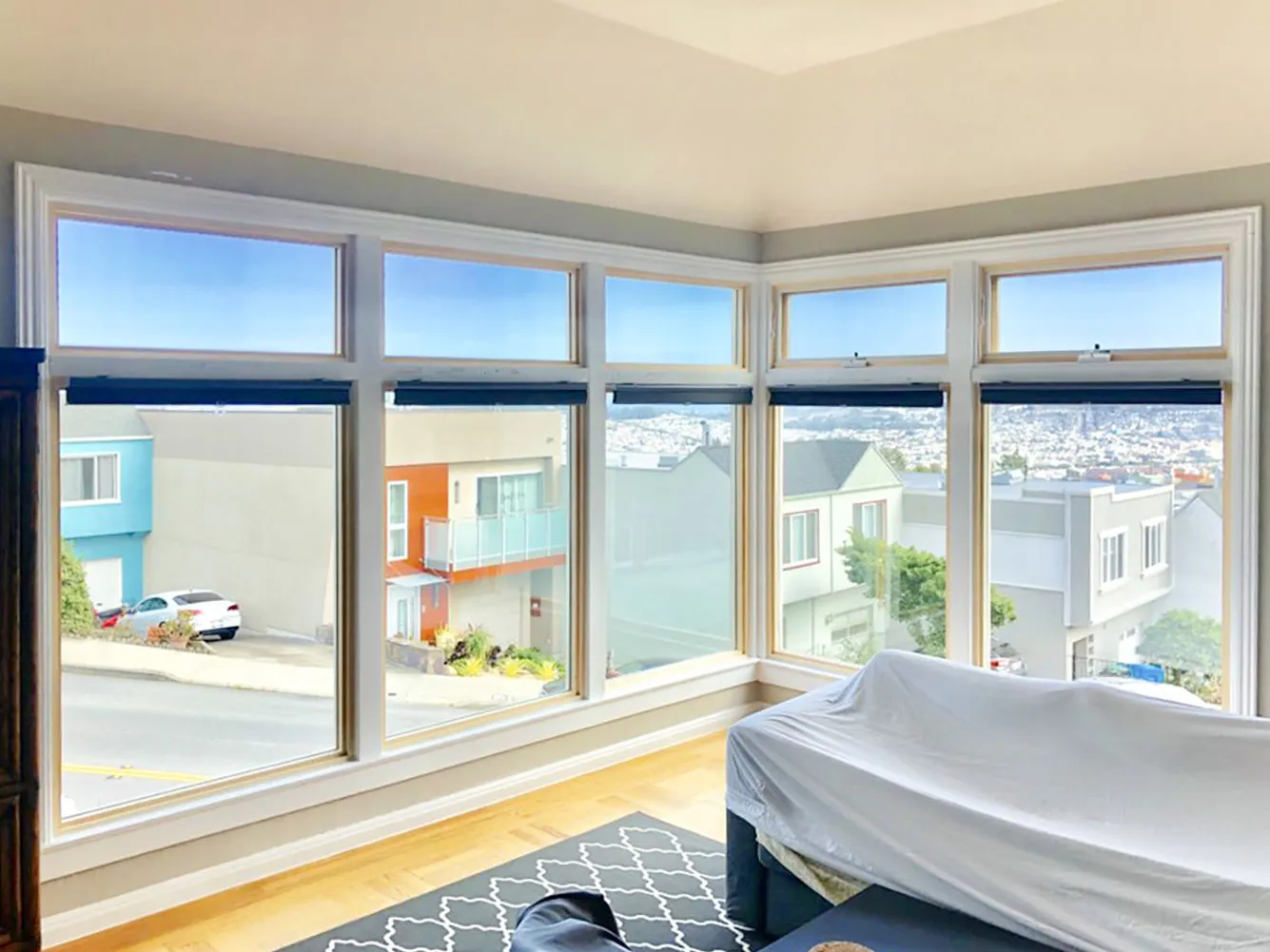 Picture of Sunlight floods through pristine, expansive windows, framing a picturesque neighborhood view. Abstract Windows brings this clarity, consistently achieving a Highest in Quality rating. Copyright ©2025 Diamond Certified Resource

 - Abstract Windows