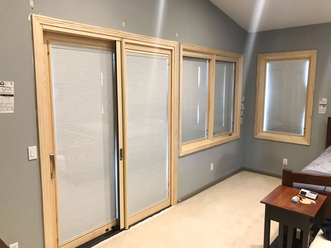 Picture of A serene interior showcases Abstract Windows' precision with newly installed sliding glass doors and adjacent windows. Known for focusing on quality outcomes, this craftsmanship reflects their commitment to excellence. Copyright ©2025 Diamond Certified Resource

 - Abstract Windows