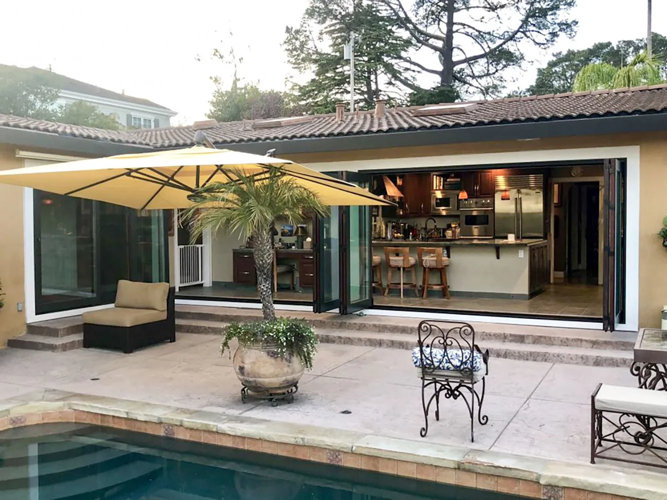 Picture of Amid the serene setting of a sunlit patio, Abstract Windows showcases its craftsmanship with expansive sliding doors that seamlessly blend indoor and outdoor spaces. Recognized for expertise and quality, their installations invite natural light, enhancing both lifestyle and aesthetics. Copyright ©2025 Diamond Certified Resource

 - Abstract Windows