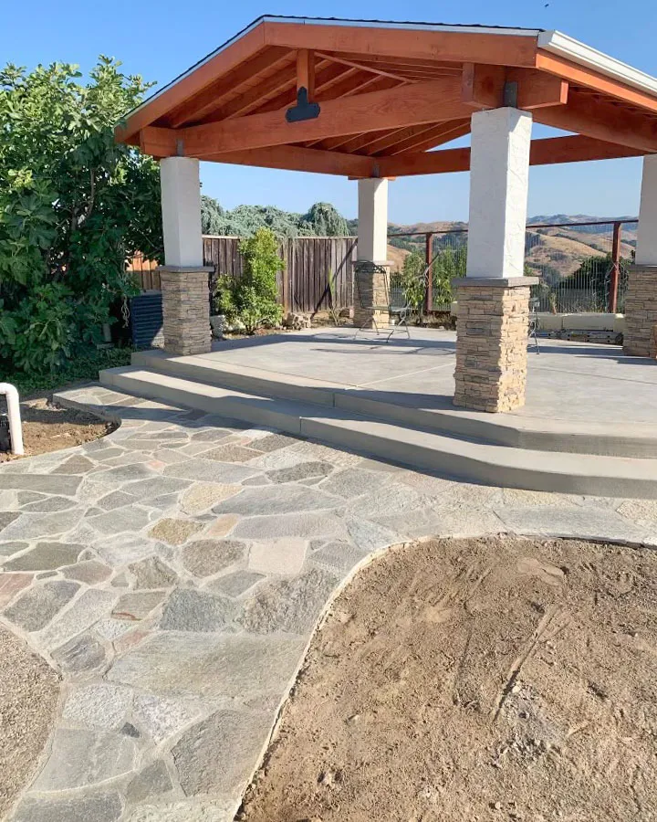 Picture of A newly constructed outdoor area by ARP Hardscape showcases expertly laid stonework leading up to a shaded pavilion, embodying the companyâ€™s commitment to quality outcomes. Recognized for expertise and quality, ARP Hardscape crafts spaces designed for lasting enjoyment. Copyright ©2025 Diamond Certified Resource

 - ARP Hardscape