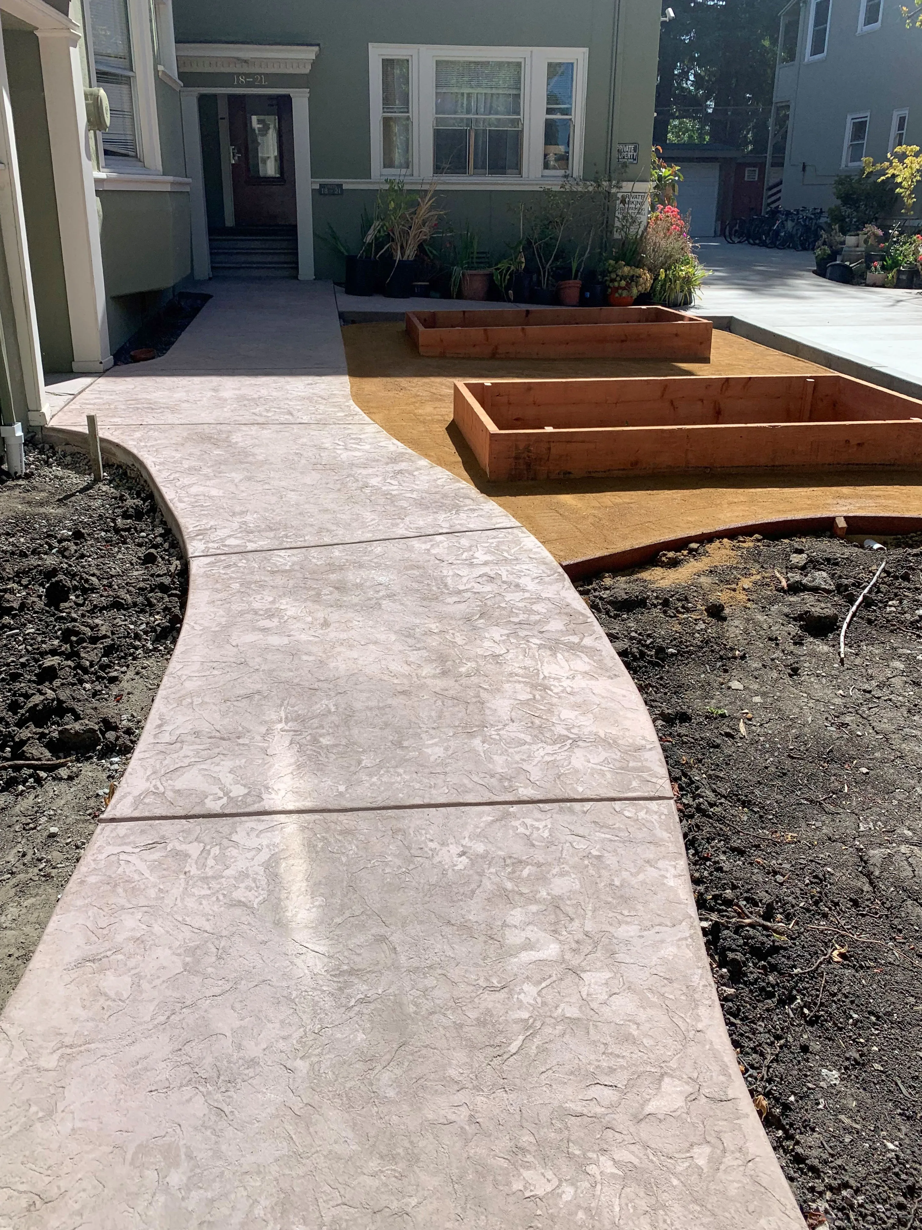 Picture of ARP Hardscape transforms a simple walkway into an artful path, guiding visitors through carefully placed garden beds. Known for its quality outcomes, the company highlights functionality combined with aesthetic appeal. Copyright ©2025 Diamond Certified Resource - ARP Hardscape