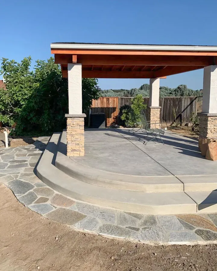 Picture of A well-crafted patio under a sturdy pergola, showcasing ARP Hardscape's dedication to quality outcomes. The intricately laid stone and clean lines suggest a timeless elegance. The company has consistently achieved a Highest in Quality rating. Copyright ©2025 Diamond Certified Resource

 - ARP Hardscape