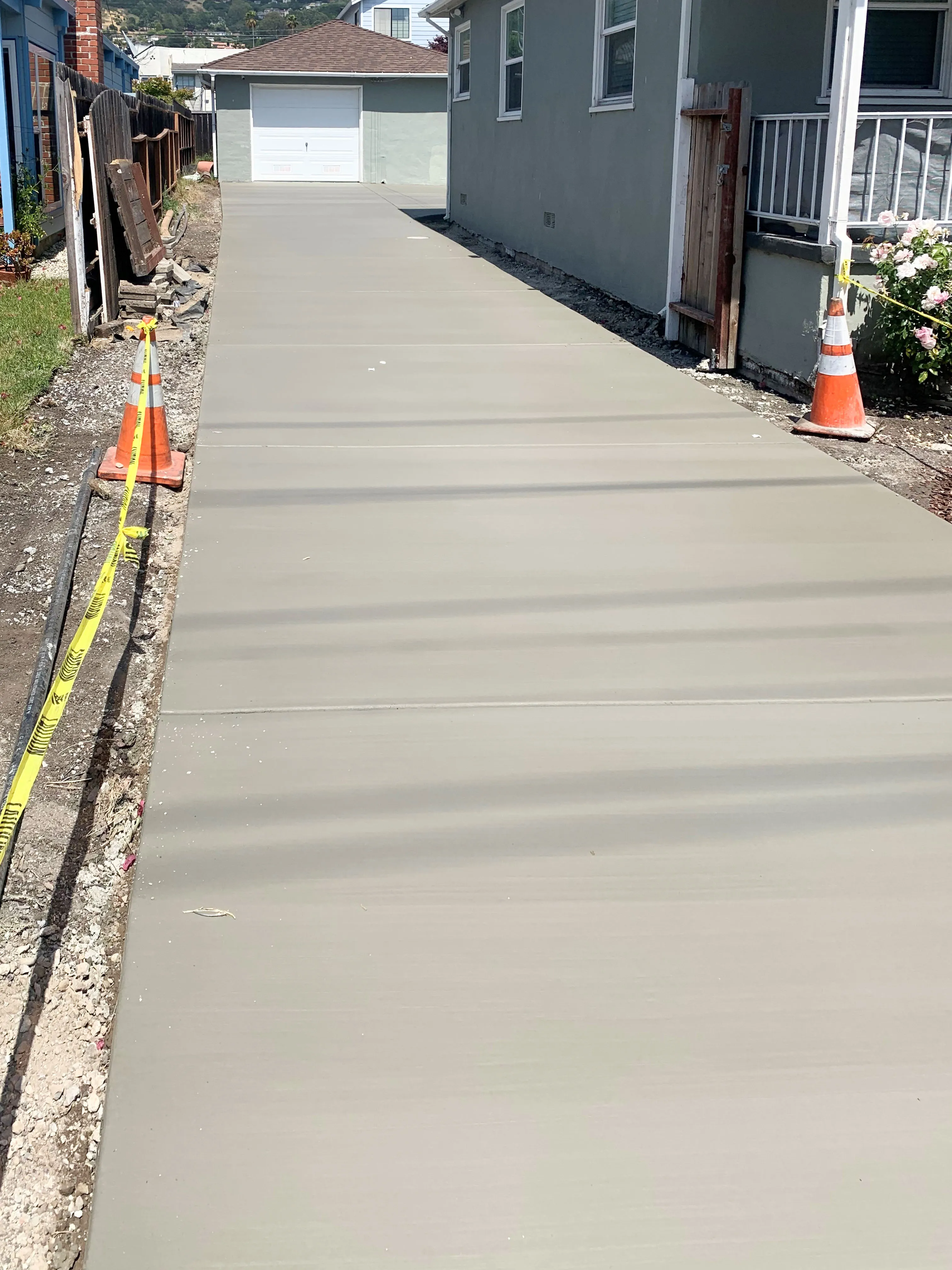 Picture of A freshly poured concrete driveway by ARP Hardscape showcases precision and attention to detail, reflecting the company's focus on quality outcomes. ARP Hardscape has consistently achieved a Highest in Quality rating. Copyright ©2025 Diamond Certified Resource

 - ARP Hardscape