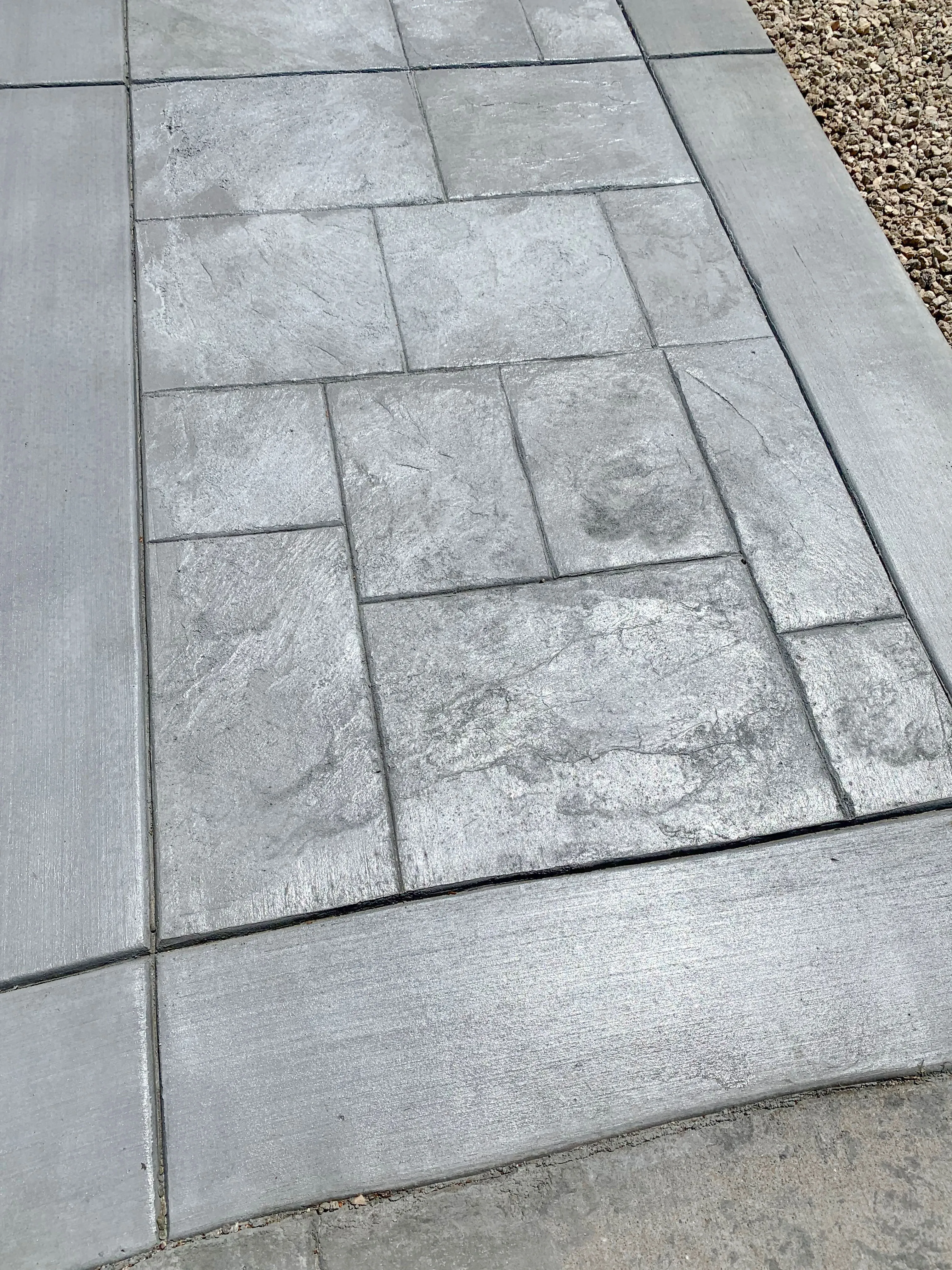 Picture of A meticulously crafted concrete patio showcases ARP Hardscape's dedication to precision and quality outcomes. The seamless integration of textures highlights their expertise in creating long-lasting designs, earning them high customer satisfaction ratings. Copyright ©2025 Diamond Certified Resource

 - ARP Hardscape