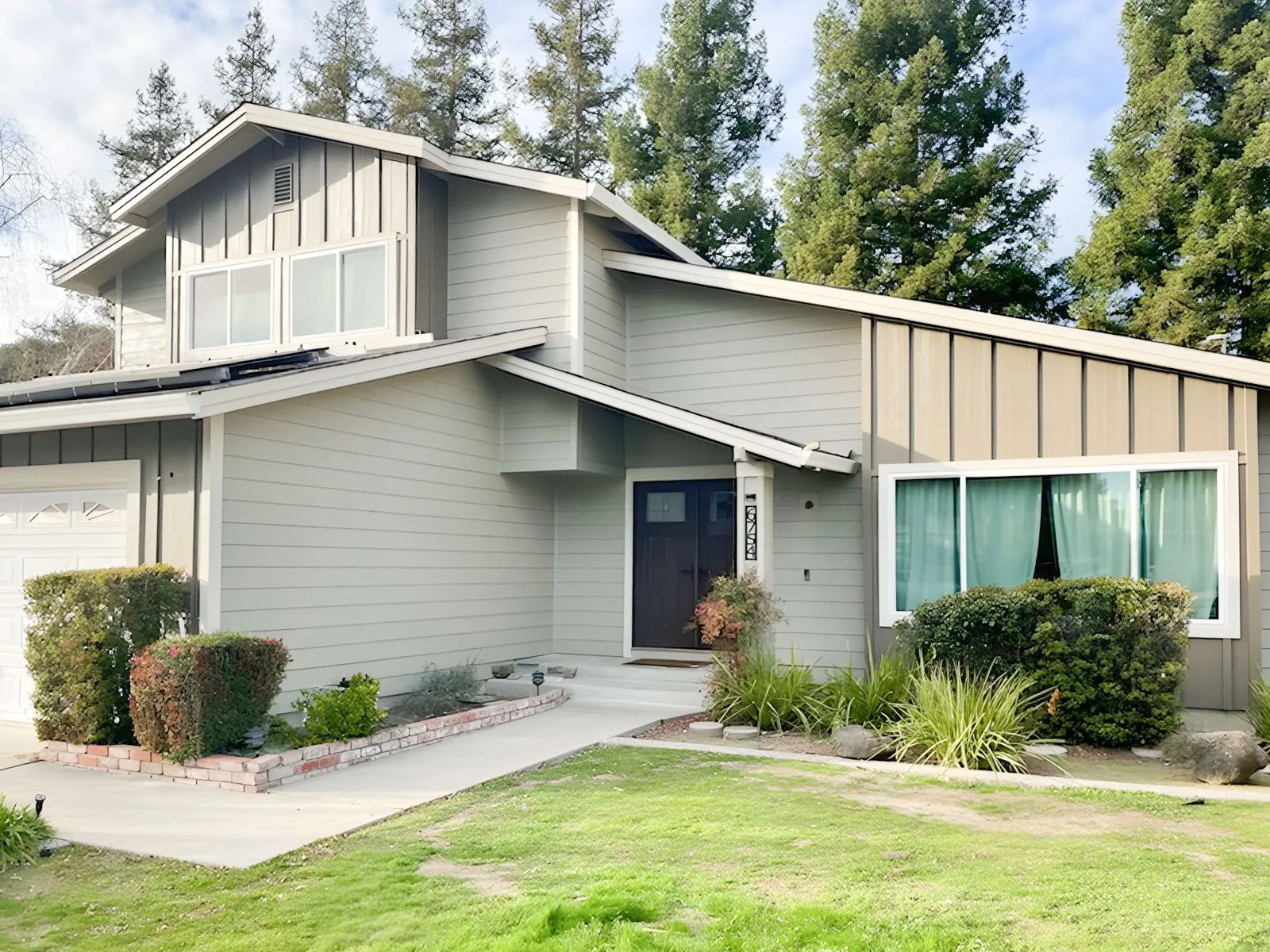 Picture of The sleek, modern siding of this home reflects Custom Exteriors, Inc.'s commitment to quality outcomes, providing an inviting and enduring facade. This project showcases their focus on quality outcomes. Copyright ©2025 Diamond Certified Resource

 - Custom Exteriors, Inc.