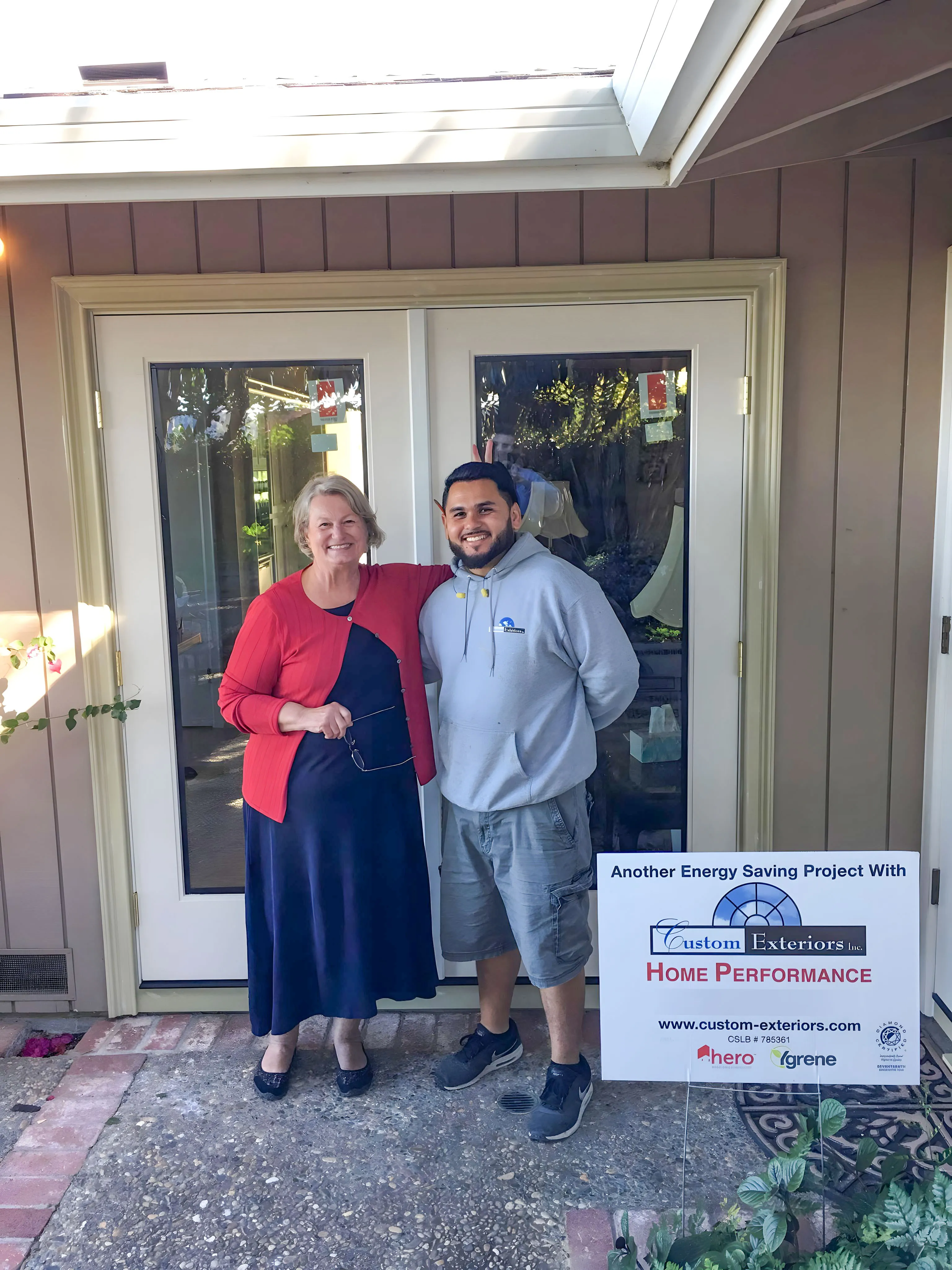 Picture of A satisfied homeowner stands beside a team member from Custom Exteriors, Inc., showcasing an energy-saving project. Known for high customer satisfaction ratings, the companyâ€™s commitment to quality is evident. Copyright ©2025 Diamond Certified Resource

 - Custom Exteriors, Inc.