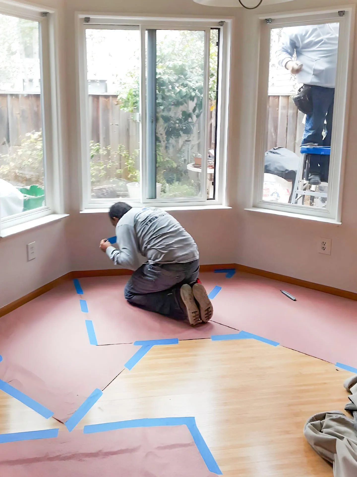 Picture of In a serene corner of a sunlit room, a craftsman meticulously prepares the floor, reflecting Custom Exteriors, Inc.'s dedication to top-rated quality. With care and precision, the company's commitment to excellence is clearly visible. Copyright ©2025 Diamond Certified Resource

 - Custom Exteriors, Inc.