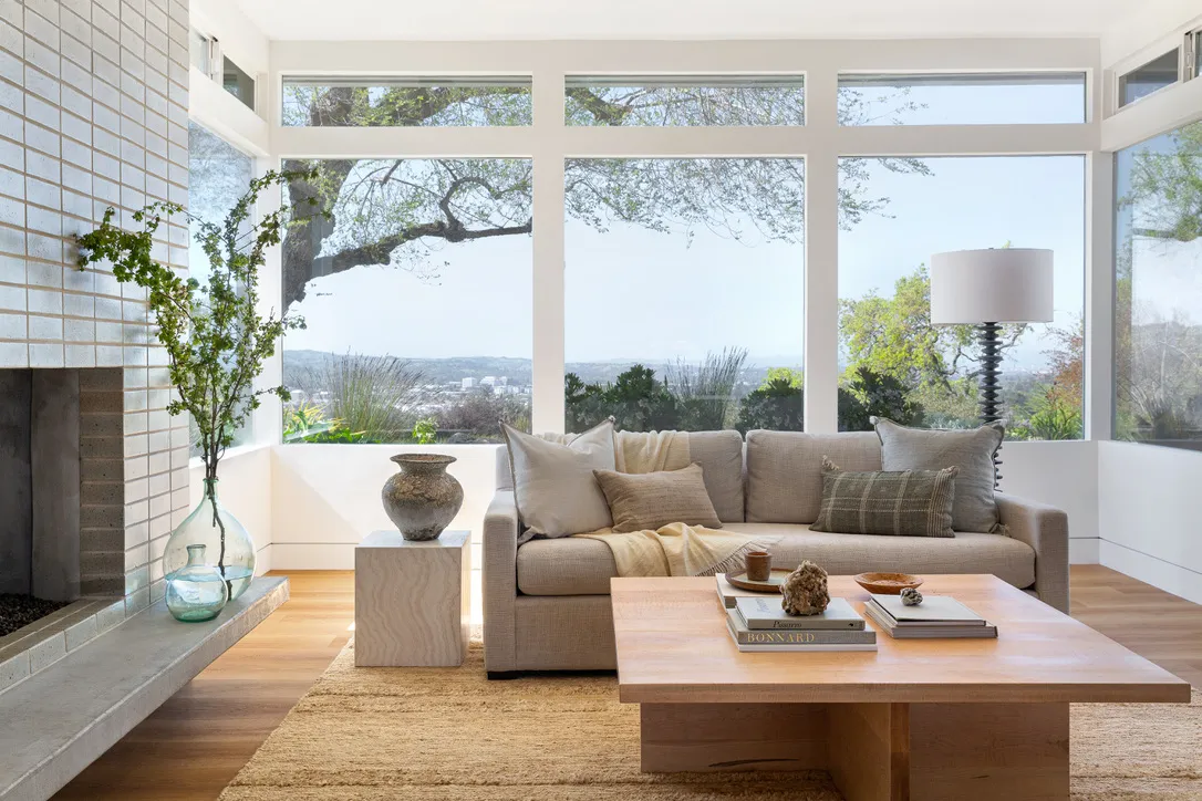 Picture of A serene living room offers panoramic views, where minimalism meets warmthâ€”a testament to Gar-Cal Corporation's commitment to quality outcomes and high customer satisfaction. Copyright ©2025 Diamond Certified Resource

 - Gar-Cal Corporation