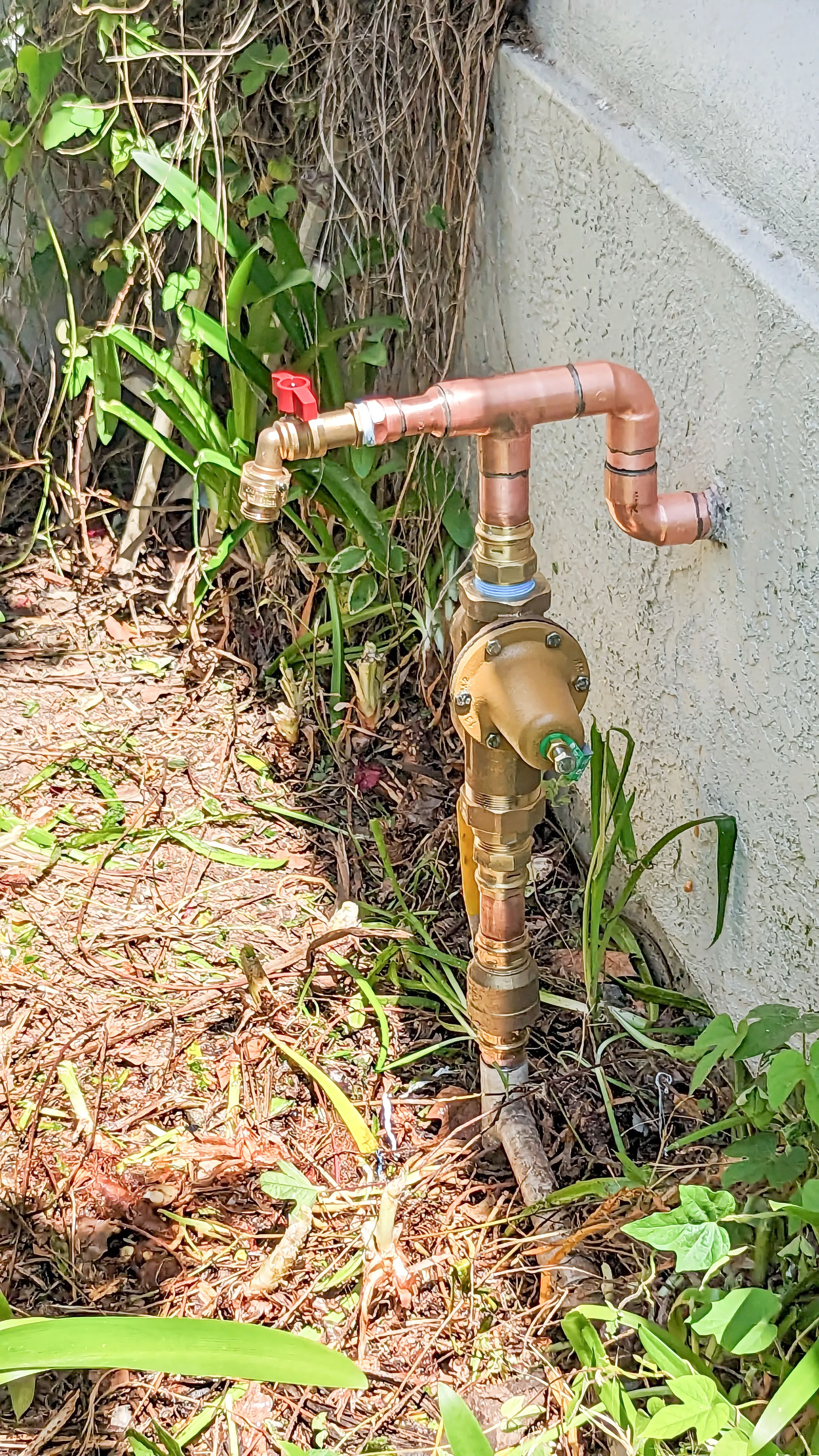 Picture of A newly installed outdoor backflow preventer gleams in the sunlight, embodying Gray Plumbing Inc.'s commitment to quality outcomes. This attention to detail reflects their Diamond Certified expertise and high customer satisfaction. Copyright ©2025 Diamond Certified Resource

 - Gray Plumbing Inc