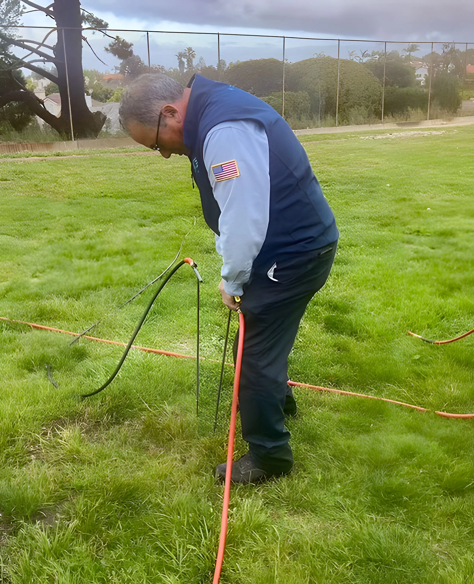 Picture of A technician from Integrated Pest Control Management Inc. carefully handles equipment on a lush green lawn, reflecting the companyâ€™s focus on quality outcomes in pest management solutions. Copyright ©2025 Diamond Certified Resource

 - Intergrated Pest Control Management Inc.
