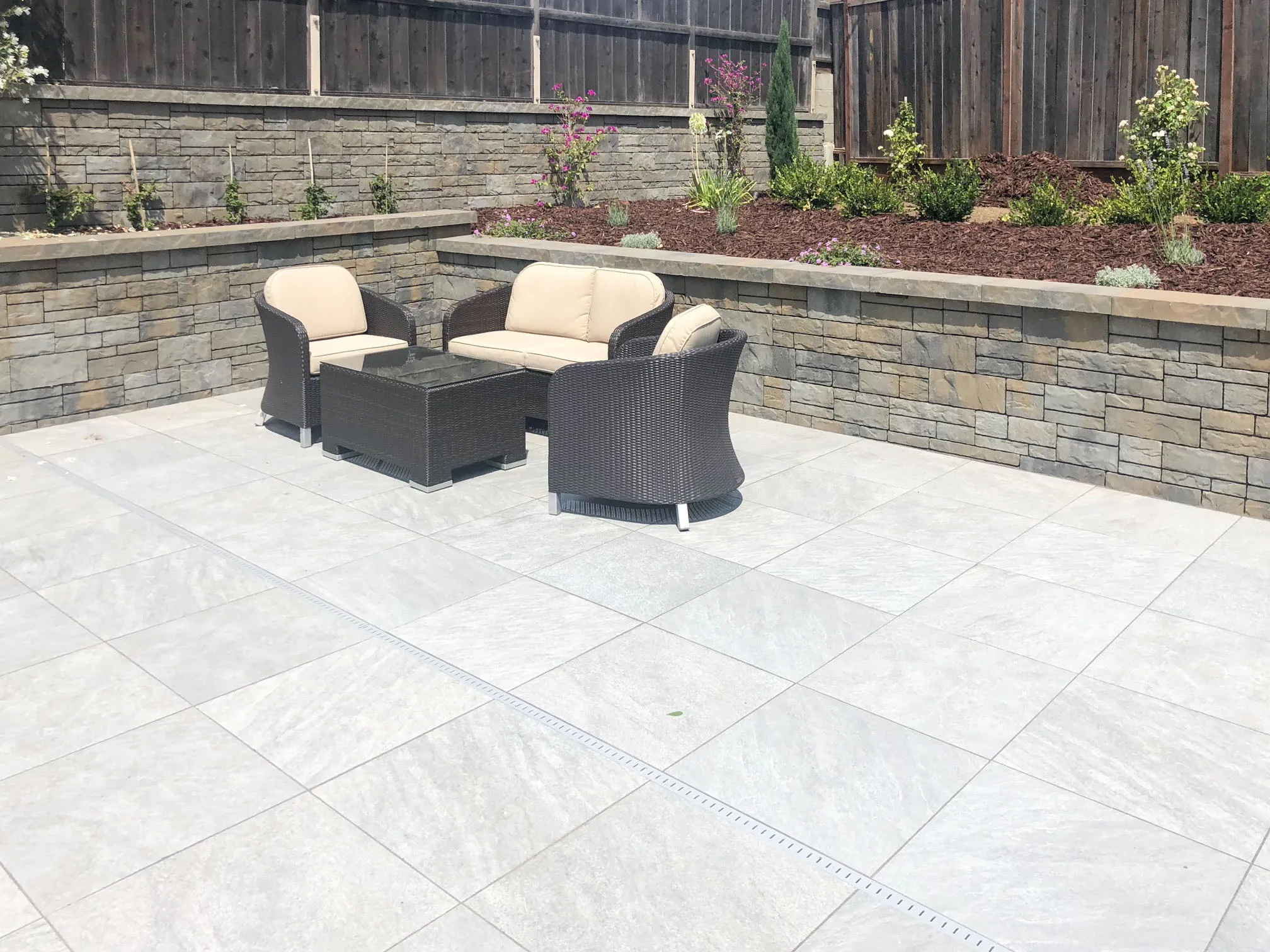 Picture of In a serene backyard setting, intricately laid stone tiles reflect Mr. Pavers Contractor Services, Inc.'s commitment to outstanding quality outcomes. Recognized for their expertise, the company transforms spaces with precision and care. Copyright ©2025 Diamond Certified Resource

 - Mr. Pavers Contractor Services, Inc.