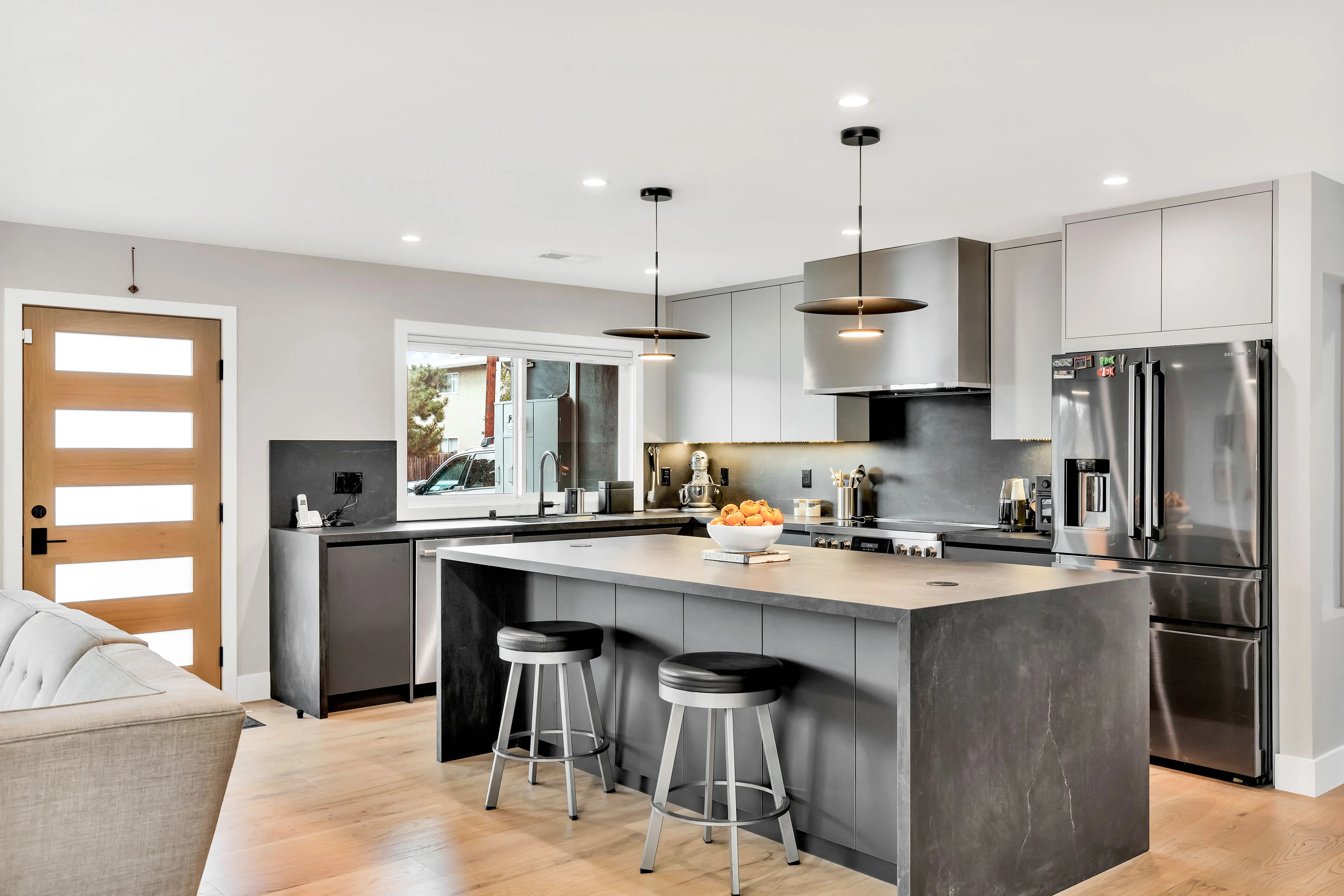 Picture of A modern kitchen glows with understated elegance, featuring sleek appliances and minimalist design elements. NuHome Remodeling, recognized for expertise and quality, crafted this space to blend functionality with style. Copyright ©2025 Diamond Certified Resource

 - NuHome Remodeling