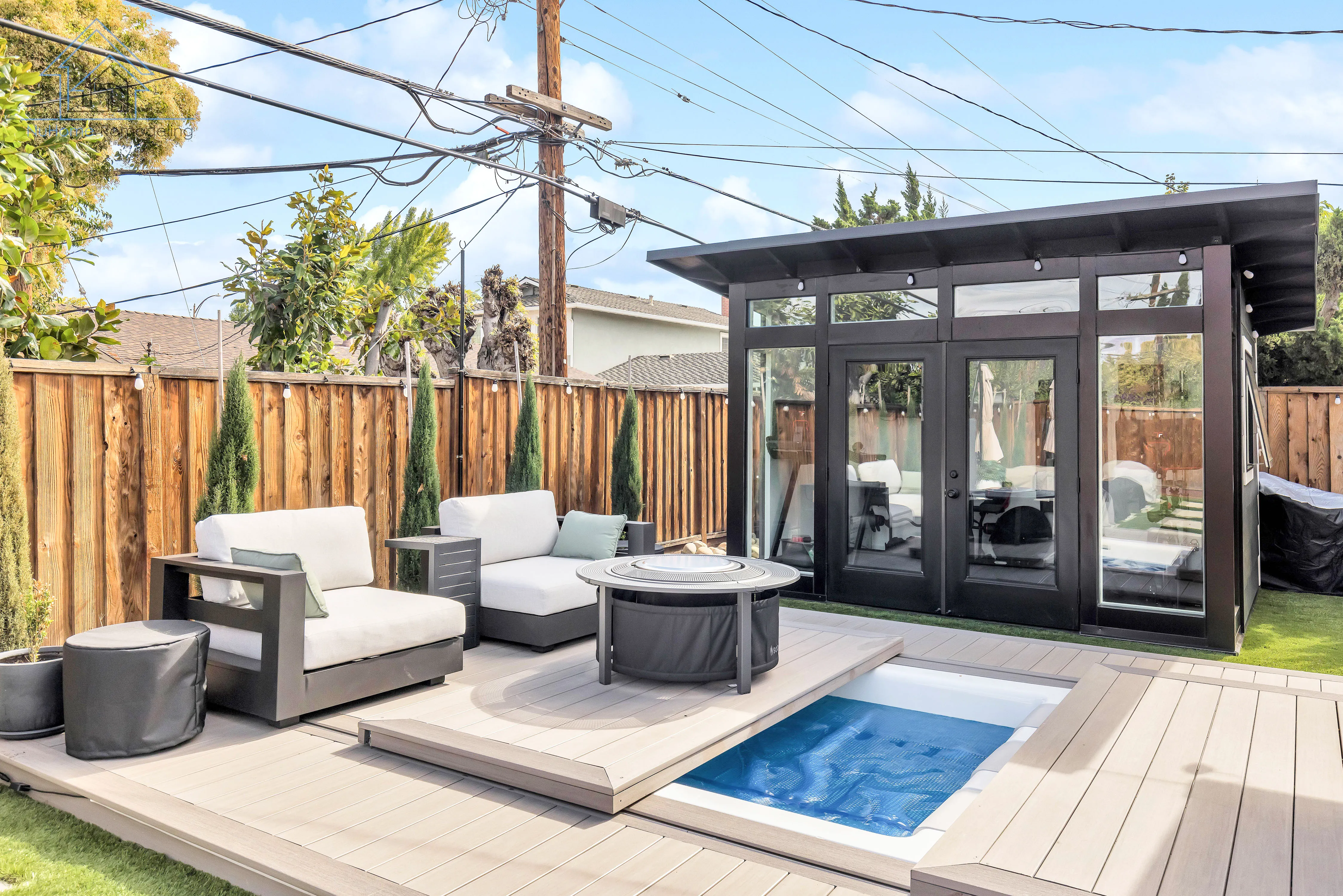 Picture of Sunlight dances on the sleek modern deck by NuHome Remodeling, where clean lines meet elegant outdoor lounging. This serene backyard oasis hints at the companyâ€™s focus on quality outcomes. Copyright ©2025 Diamond Certified Resource

 - NuHome Remodeling