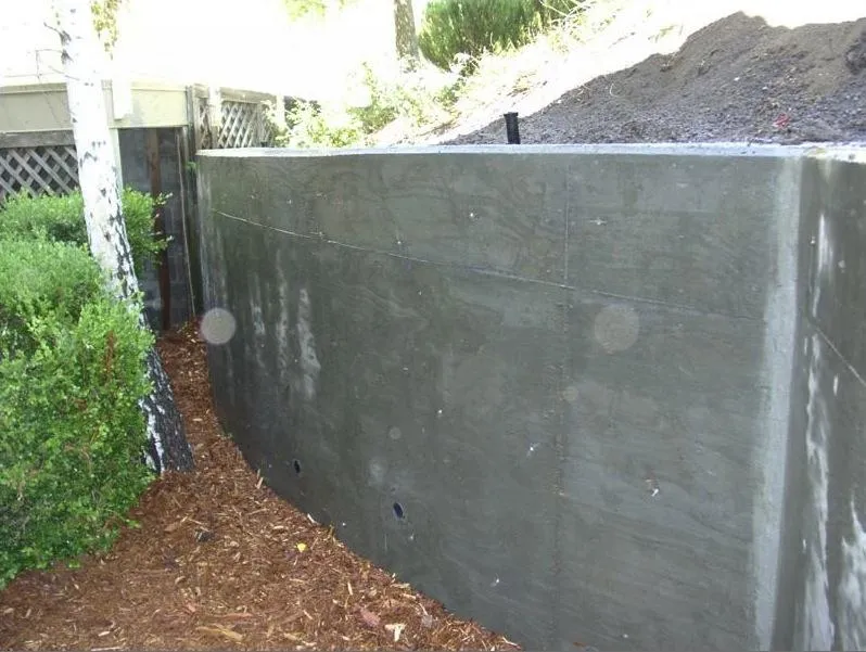 Picture of  Amidst a lush setting, a newly constructed retaining wall showcases the craftsmanship of Engineered Soil Repairs, Inc., a company consistently achieving a Highest in Quality rating for their expert solutions. Copyright ©2025 Diamond Certified Resource.

 - Engineered Soil Repairs, Inc.