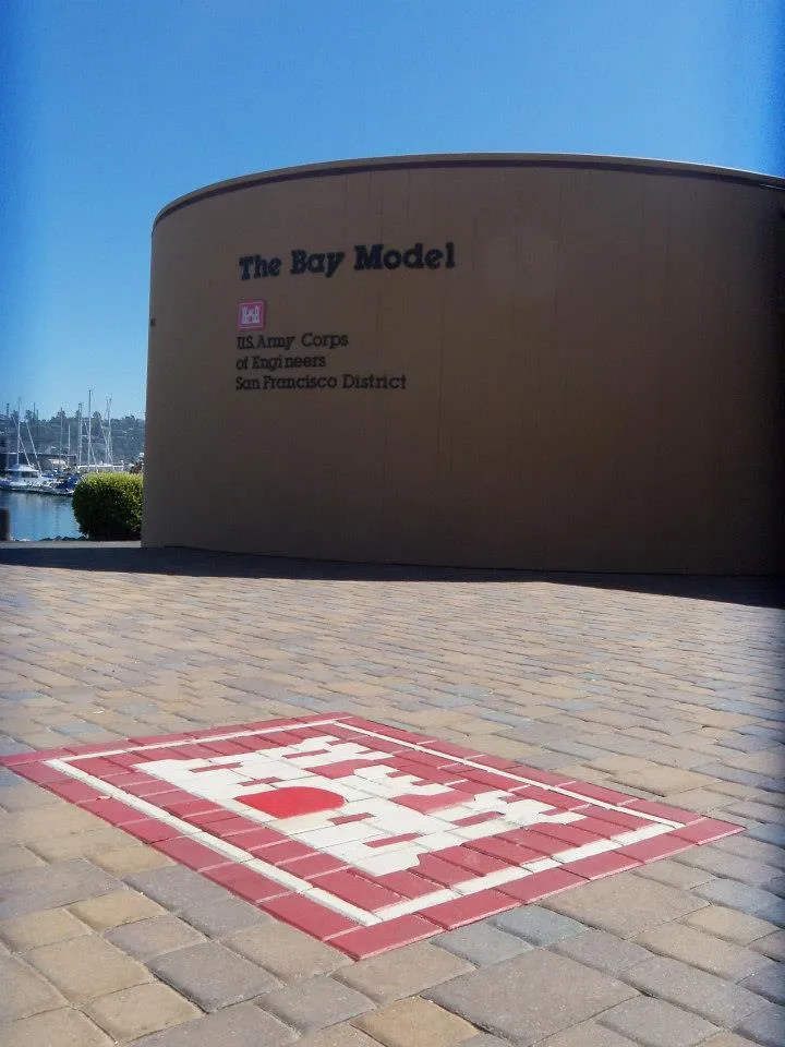 Picture of A meticulously laid brick pathway leads to The Bay Model, where The Legacy Paver Groupâ€™s craftsmanship is on full display. Their commitment to quality outcomes has earned them Diamond Certified. Copyright ©2025 Diamond Certified Resource - The Legacy Paver Group