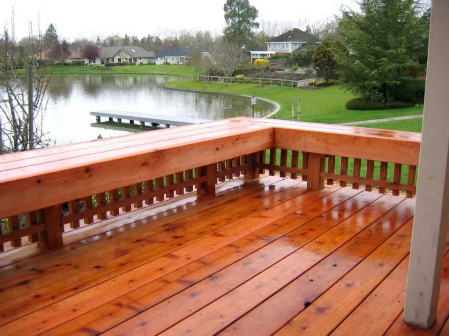 Picture of  A freshly stained wooden deck overlooks a serene waterfront, reflecting Gold Hammer Construction, Inc.'s commitment to quality outcomes in creating harmonious outdoor spaces. Recognized for expertise and quality, the company transforms visions into reality. Copyright ©2025 Diamond Certified Resource.

 - Gold Hammer Construction, Inc.