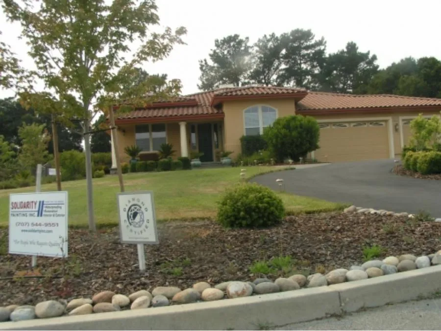 Picture of  A serene home landscape with vibrant greenery reflects the meticulous attention to detail offered by Solidarity Painting, Inc. Their commitment to quality outcomes is clear. Copyright ©2025 Diamond Certified Resource.

 - Solidarity Painting, Inc.