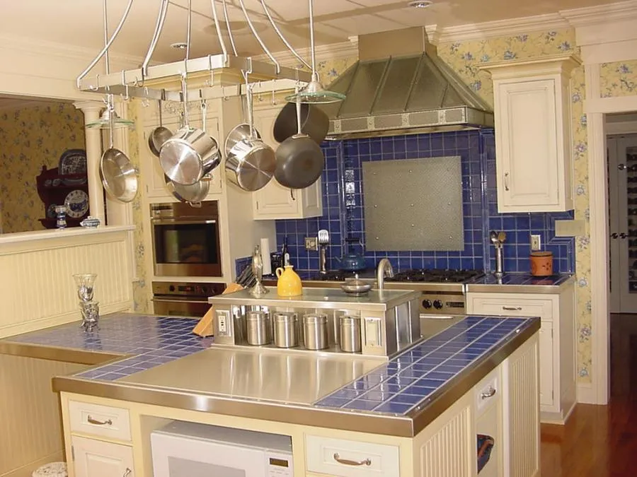 Picture of Amidst the serene ambiance of a kitchen adorned with striking blue tiles, Bell Products, Inc. showcases their dedication to quality outcomes, blending functionality with aesthetics. Their commitment has consistently achieved a Highest in Quality rating. Copyright ©2025 Diamond Certified Resource. - Bell Products, Inc.