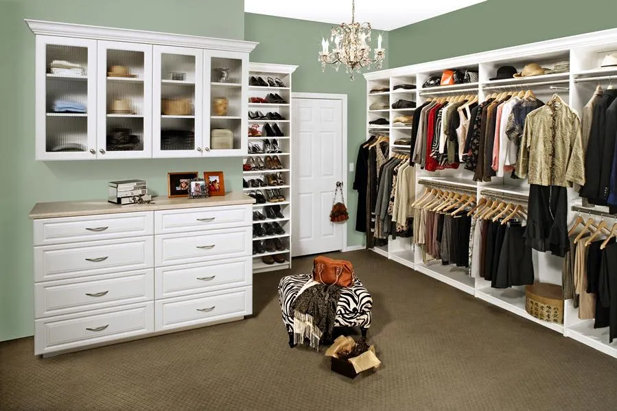 Picture of A meticulously organized walk-in closet showcases PremierGarageâ€™s commitment to quality outcomes, with ample space for clothing and accessories. The elegant setup reflects the companyâ€™s high customer satisfaction ratings. Copyright ©2025 Diamond Certified Resource

 - PremierGarage
