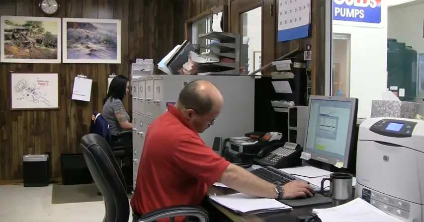 Picture of In the office of Jerry and Don's Yager Pump and Well Service, a diligent employee inputs data into a computer, ensuring precise and quality outcomes. The company, recognized for expertise and quality, exemplifies dedication to client satisfaction. Copyright ©2025 Diamond Certified Resource - Jerry & Don's Yager Pump & Well Service