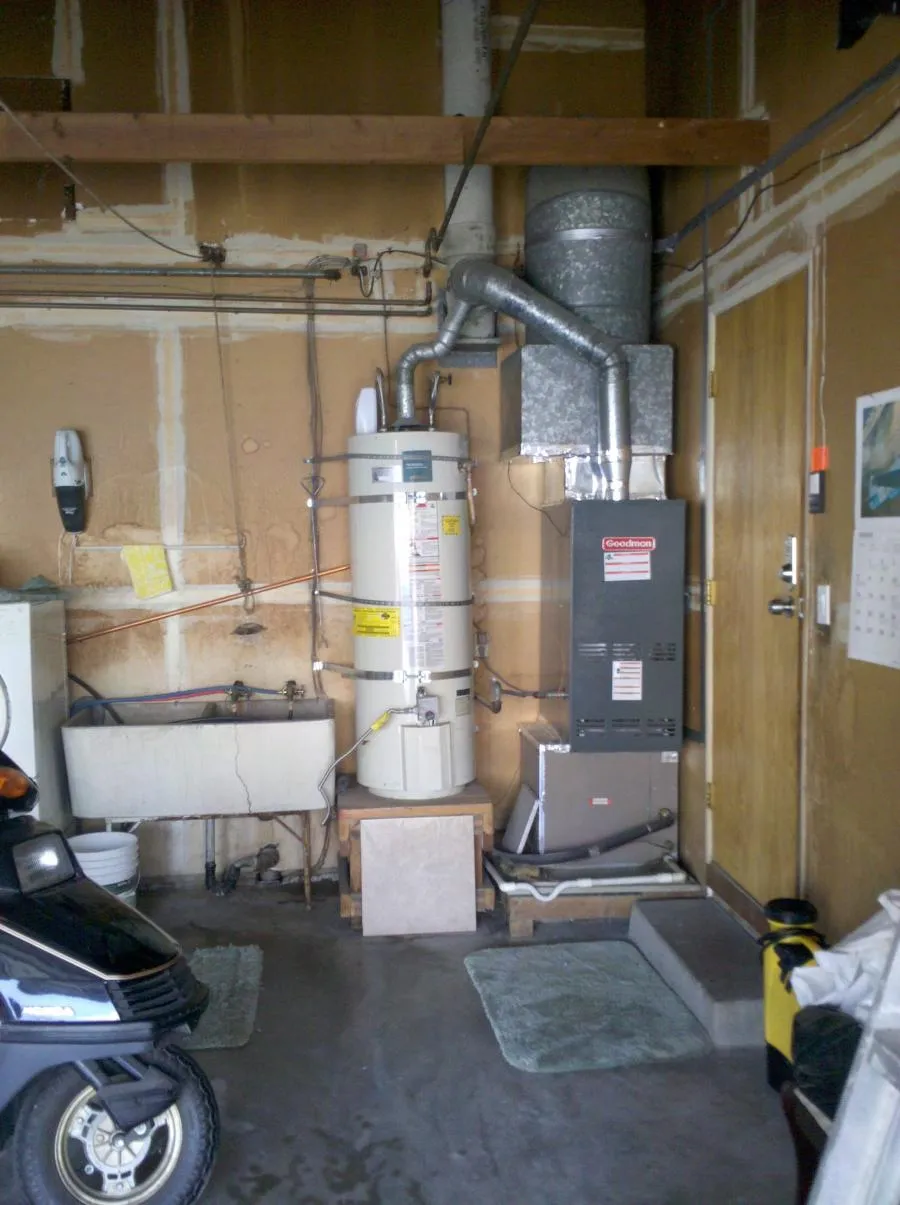 Picture of In a neatly organized utility area, an efficient water heater setup highlights Benjamin Franklin Plumbing's dedication to quality outcomes. Their commitment to excellence underscores their reputation for high-quality service. Copyright ©2025 Diamond Certified Resource

 - Benjamin Franklin Plumbing