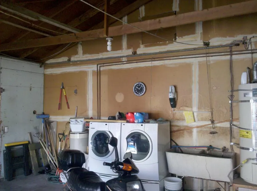 Picture of In a neatly organized garage with a washer and dryer setup, Benjamin Franklin Plumbing focuses on delivering quality outcomes, evidenced by their expert handling of utility spaces. Consistently achieving a Highest in Quality rating, they enhance efficiency and satisfaction. Copyright ©2025 Diamond Certified Resource

 - Benjamin Franklin Plumbing