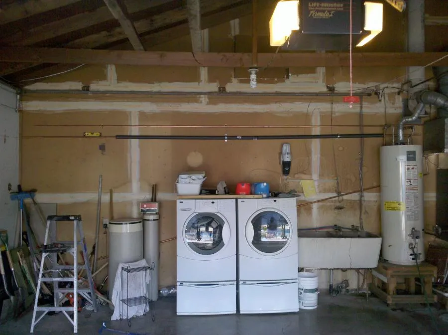 Picture of In a neatly organized garage, the alignment of tools and appliances reflects the precision that Benjamin Franklin Plumbing is renowned for. Their commitment to quality outcomes ensures customer satisfaction. Copyright ©2025 Diamond Certified Resource - Benjamin Franklin Plumbing