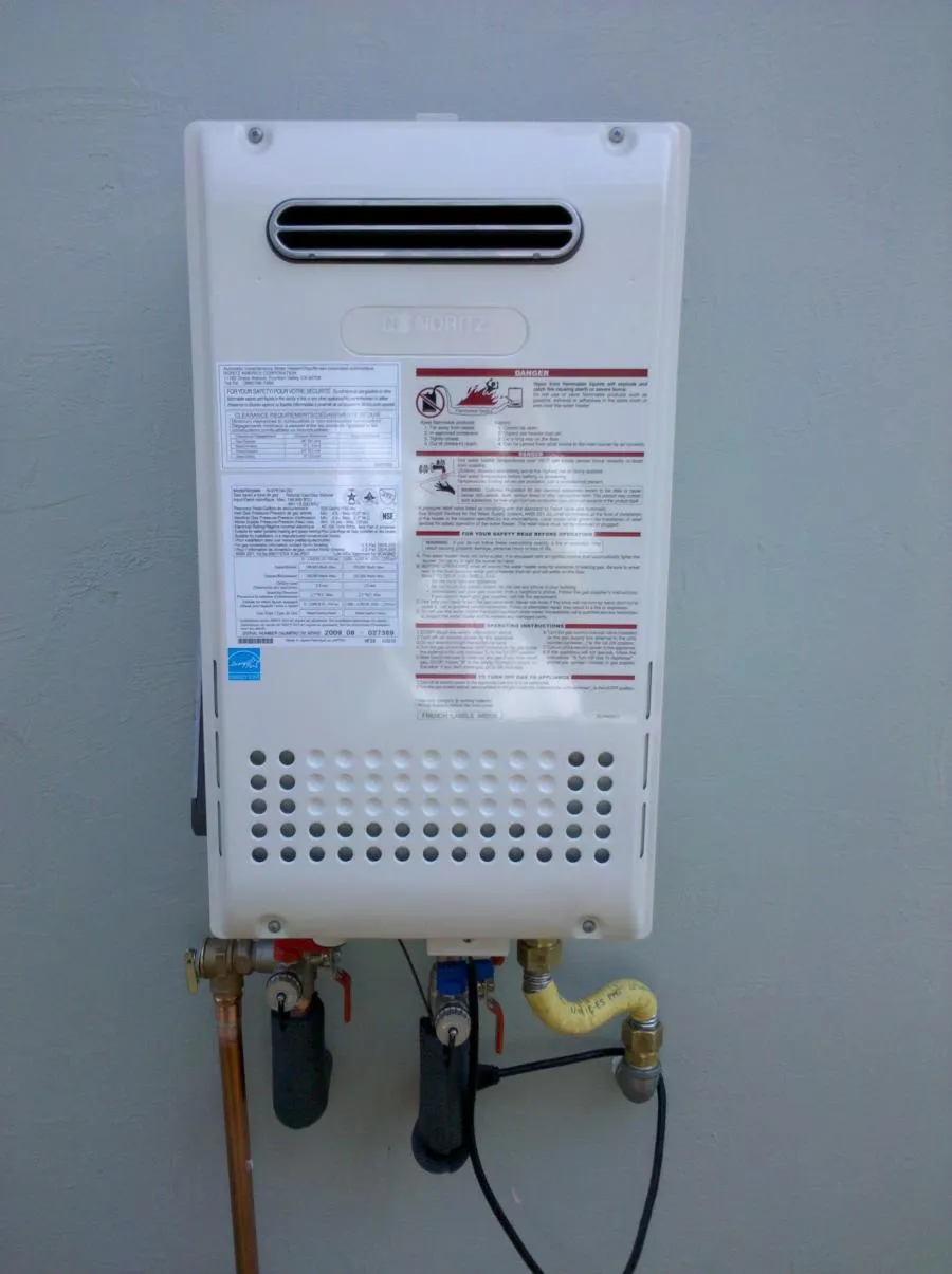 Picture of A sleek tankless water heater exemplifies Benjamin Franklin Plumbingâ€™s focus on quality outcomes, ensuring efficient water heating solutions. This image reflects the companyâ€™s Diamond Certified recognition. Copyright ©2025 Diamond Certified Resource

 - Benjamin Franklin Plumbing