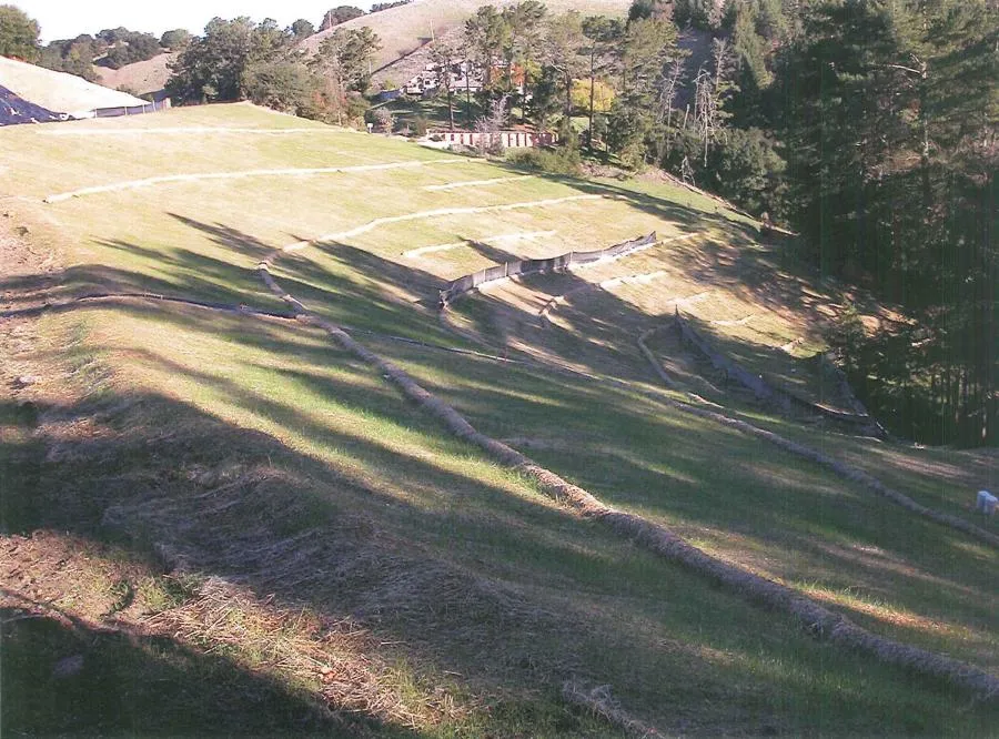 Picture of  Engineered Soil Repairs, Inc. showcases their expertise in stabilizing steep terrains, as shadowed slopes reveal carefully placed erosion control measures. A testament to their Diamond Certified quality outcomes. Copyright ©2025 Diamond Certified Resource.

 - Engineered Soil Repairs, Inc.