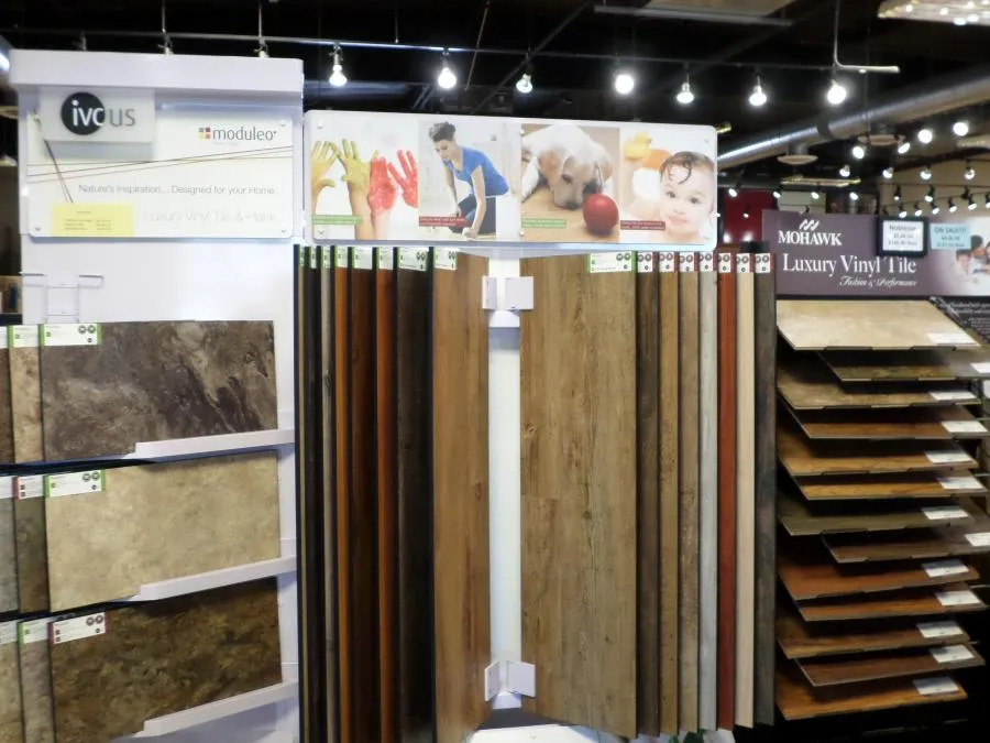 Picture of At The Floor Store, a variety of luxury vinyl tiles are on display, showcasing the intricate options available for every taste. The company is recognized for expertise and quality, ensuring customers find the perfect match for their homes. Copyright ©2025 Diamond Certified Resource

 - The Floor Store