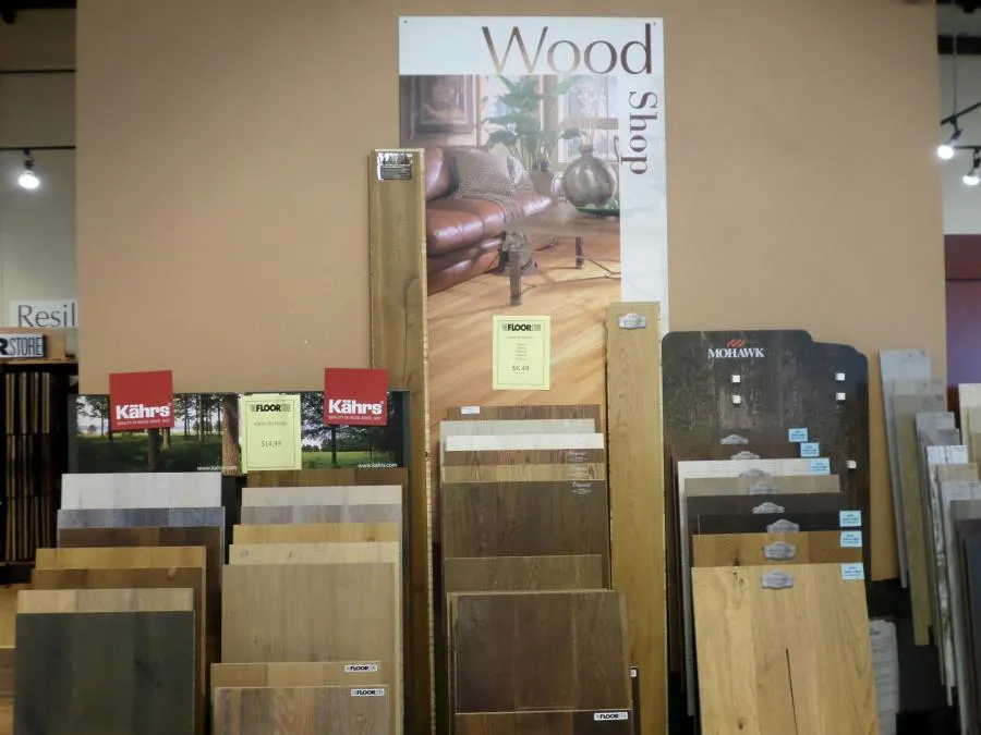 Picture of In the Wood Shop section of The Floor Store, a diverse array of wood samples awaits discerning customers, reflecting the store's commitment to quality outcomes. The Floor Store has earned Diamond Certified for its expertise and quality. Copyright ©2025 Diamond Certified Resource

 - The Floor Store