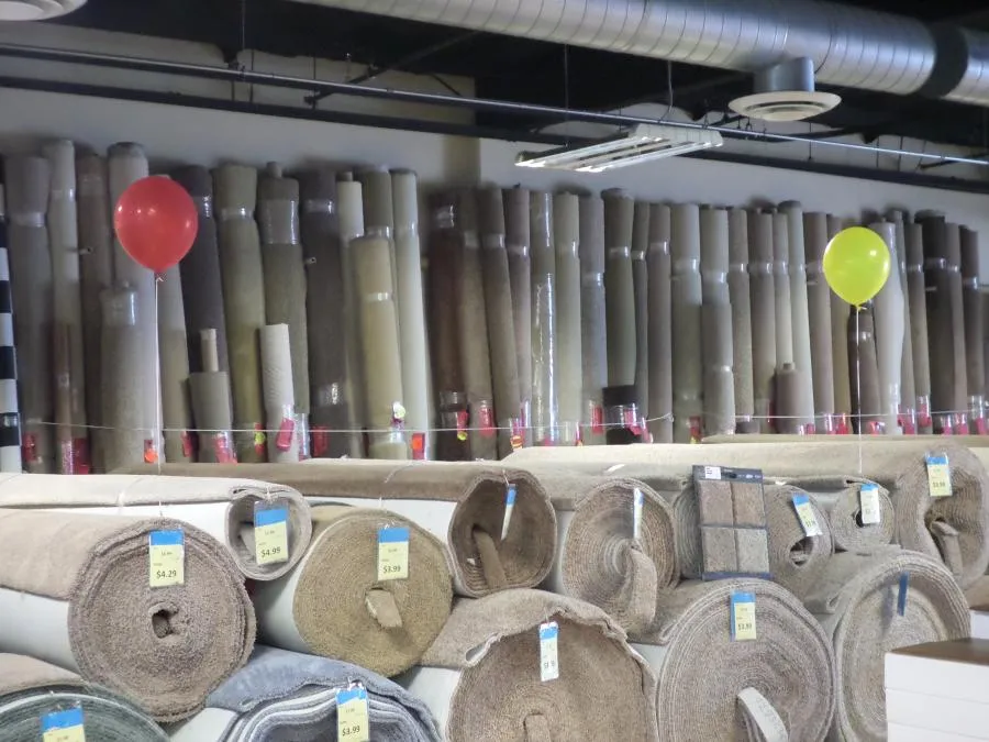 Picture of Amidst vibrant balloons, The Floor Store showcases neatly rolled carpets in diverse textures and colors. Their dedication to quality outcomes is as evident as ever. Copyright ©2025 Diamond Certified Resource

 - The Floor Store
