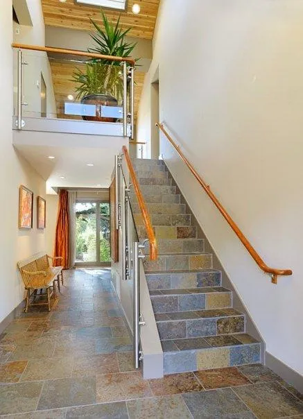 Picture of  Bell Products, Inc.'s commitment to quality is reflected in the meticulous design of this modern, sunlit staircase, embodying their focus on quality outcomes. Copyright ©2025 Diamond Certified Resource.

 - Bell Products, Inc.