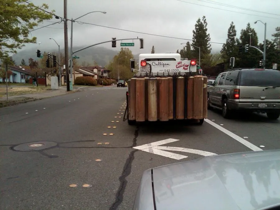 Picture of A Culligan Water of Sonoma County truck, equipped with water tanks, pauses at a traffic light amidst the bustling streets of Sonoma County. Known for high customer satisfaction ratings, Culligan ensures quality water solutions on the go. Copyright ©2025 Diamond Certified Resource

 - Culligan Water of Sonoma County