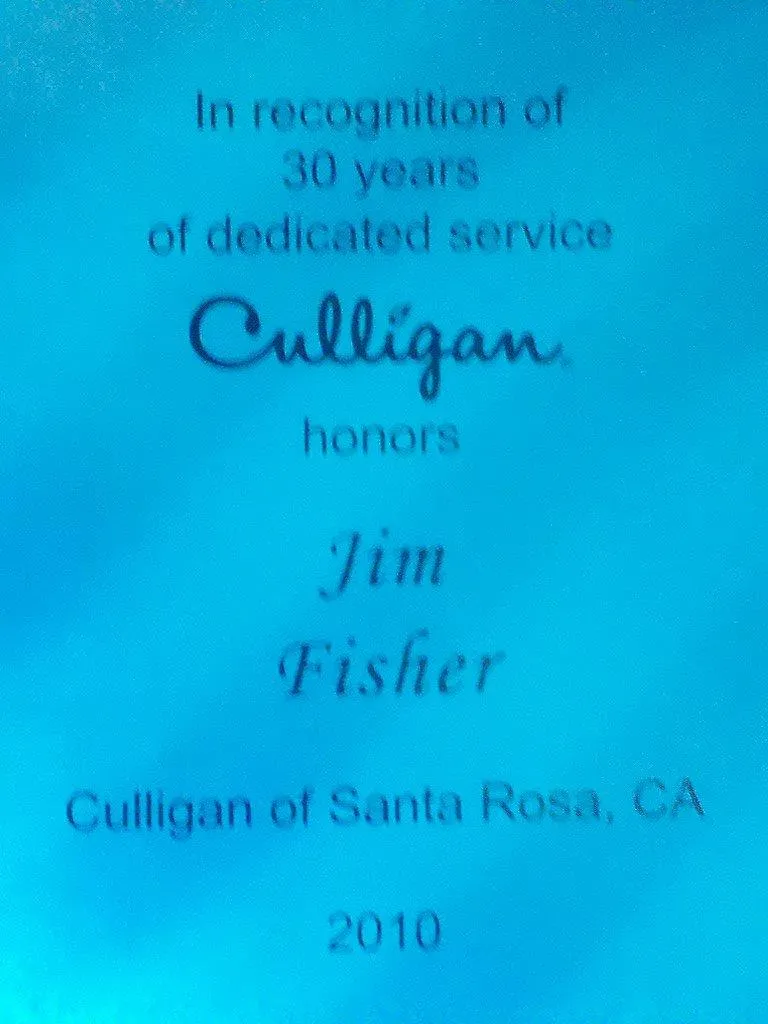 Picture of A commemorative plaque celebrates Jim Fisherâ€™s 30 years of dedicated service at Culligan Water of Sonoma County, symbolizing the company's focus on quality outcomes. Copyright ©2025 Diamond Certified Resource - Culligan Water of Sonoma County