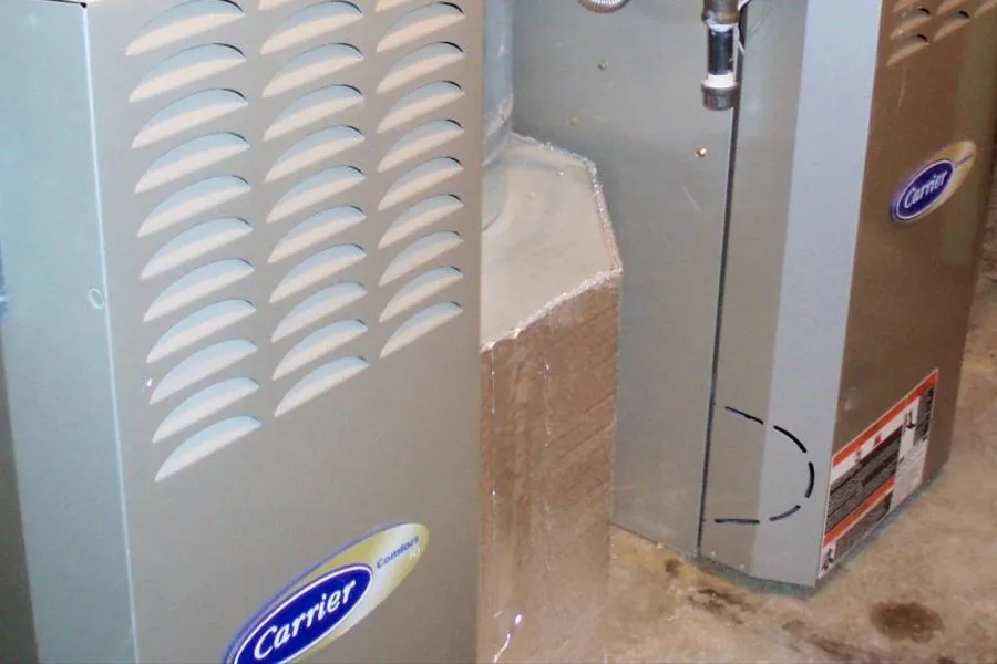 Picture of  Schmitt Heating Company, Inc. showcases a meticulously installed Carrier furnace, embodying their focus on quality outcomes and reliable service. Recognized for expertise and quality, they ensure each system operates with precision. Copyright ©2025 Diamond Certified Resource.

 - Schmitt Heating Company, Inc.