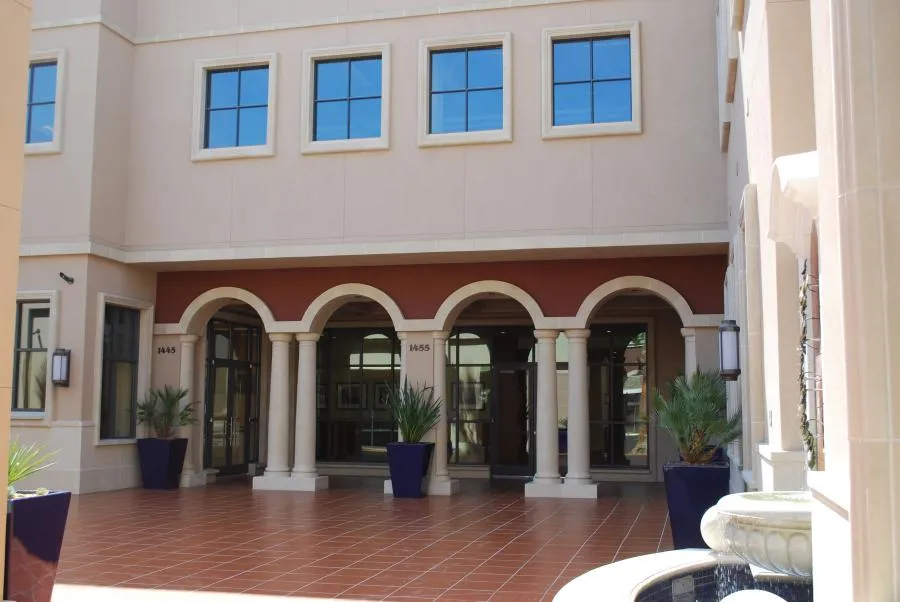 Picture of The understated elegance of arched entrances and potted plants hints at Bell Products, Inc.'s dedication to quality outcomes in their architectural projects. Their high customer satisfaction ratings reflect this commitment. Copyright ©2025 Diamond Certified Resource. - Bell Products, Inc.