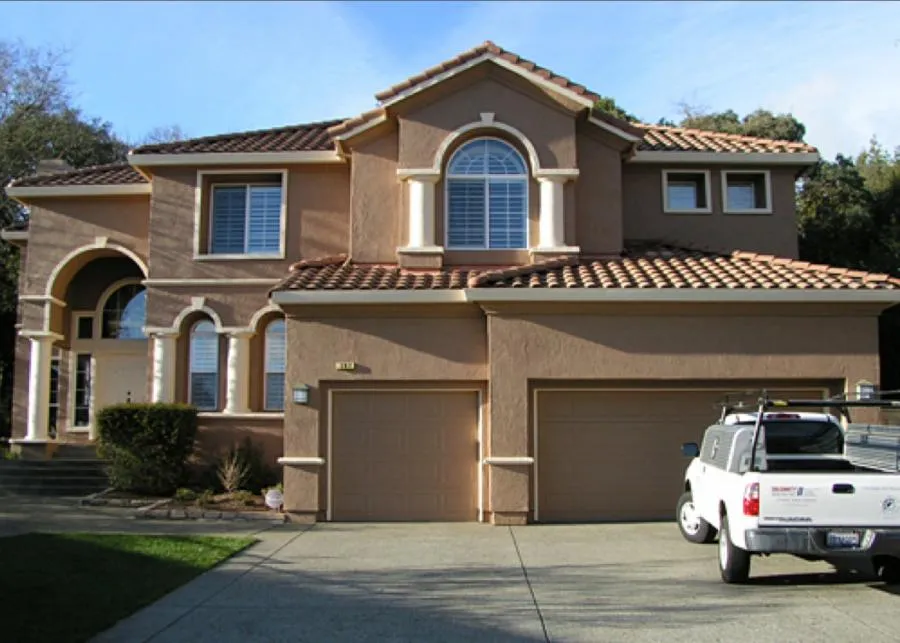 Picture of  A well-maintained home stands testament to Solidarity Painting, Inc.'s commitment to quality outcomes. The neatly parked company vehicle hints at their expert touch, consistently achieving the highest ratings in customer satisfaction. Copyright ©2025 Diamond Certified Resource.

 - Solidarity Painting, Inc.