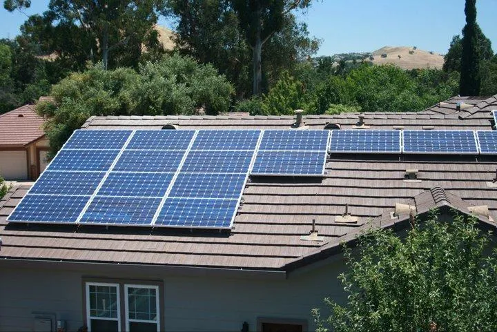 Picture of  Sunlight meets expertise on a suburban rooftop where solar panels are neatly aligned, capturing renewable energy. Quality First Home Improvement, Inc. ensures the highest in quality and helpful expertise, powering sustainable homes. Copyright ©2025 Diamond Certified Resource.

 - Quality First Home Improvement, Inc.