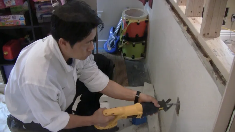 Picture of  A focused craftsman from Aren Electric Co., Inc. uses precision tools to enhance a client's living space, reflecting the company's dedication to quality outcomes. Aren Electric Co., Inc. is recognized for expertise and quality. Copyright ©2025 Diamond Certified Resource.

 - Aren Electric Co., Inc.