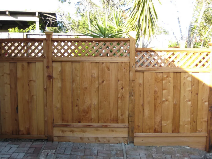 Picture of California Fencing highlights its dedication to quality outcomes in this beautifully crafted wooden fence, showcasing expert craftsmanship and attention to detail. The intricate latticework adds elegance, embodying the company's high customer satisfaction ratings. Copyright ©2025 Diamond Certified Resource

 - California Fencing